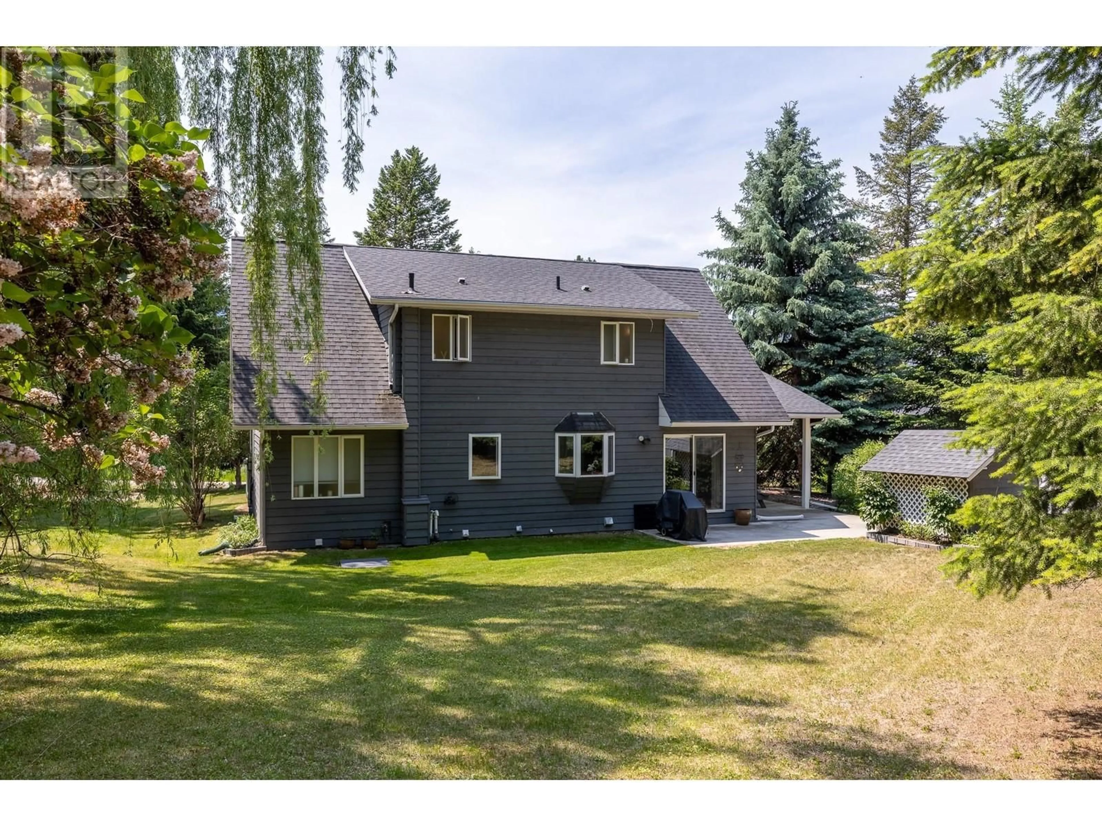 A pic from outside/outdoor area/front of a property/back of a property/a pic from drone, street for 4909 MEADOWS CRESCENT, Fairmont Hot Springs British Columbia V0B1L0