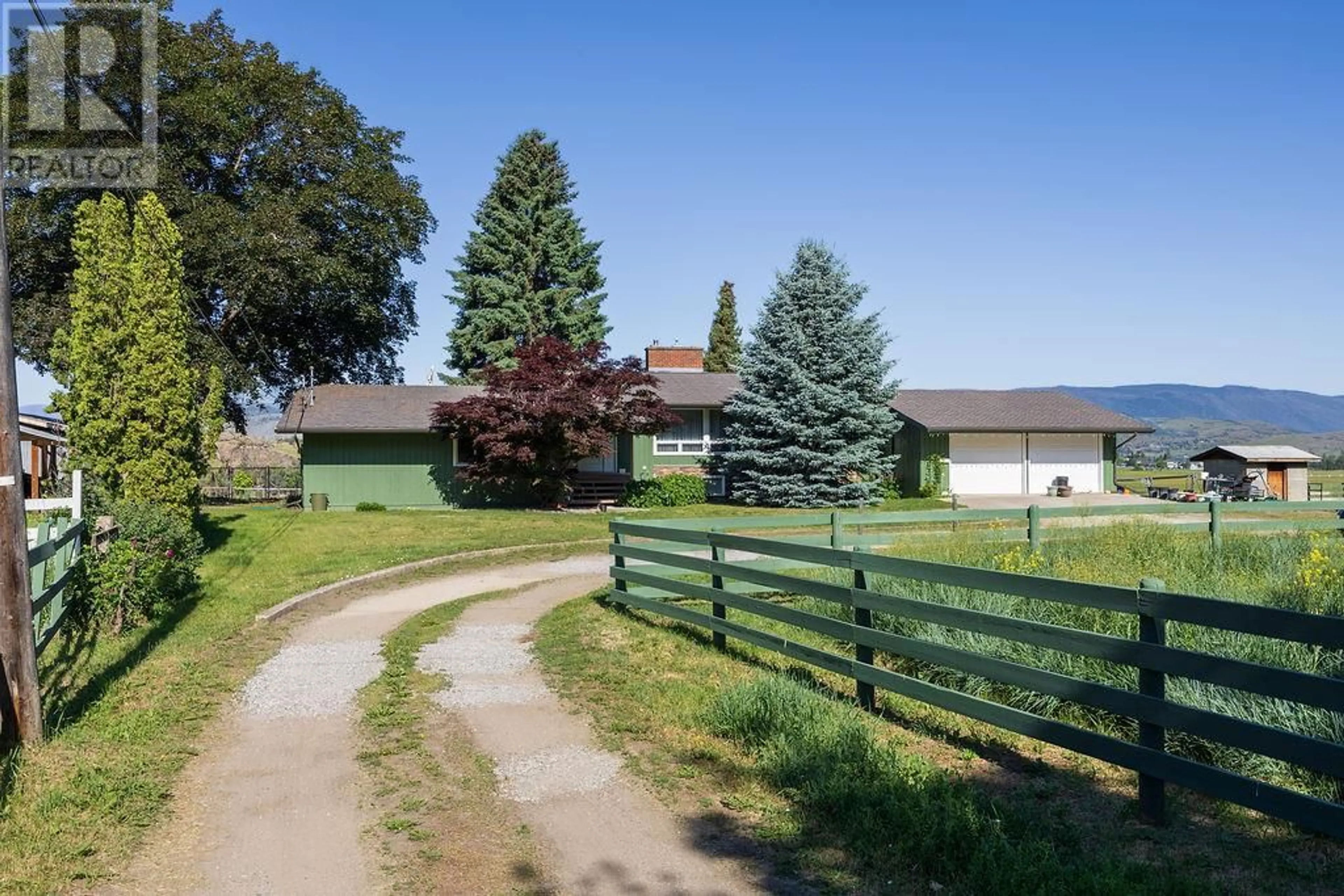 A pic from outside/outdoor area/front of a property/back of a property/a pic from drone, street for 3796 EAST VERNON ROAD, Vernon British Columbia V1B3H7