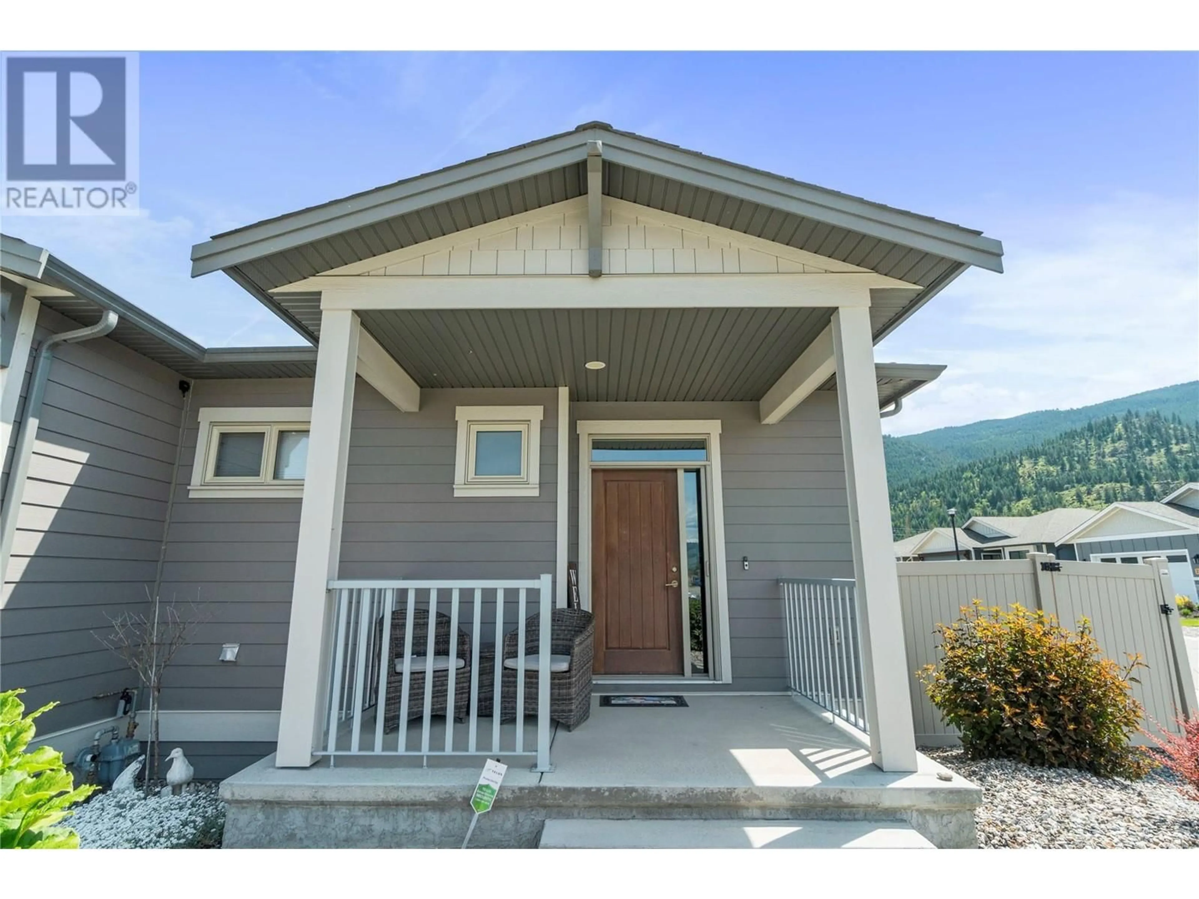 Home with vinyl exterior material, mountain view for 2257 RAHN AVENUE, Armstrong British Columbia V0E1B8