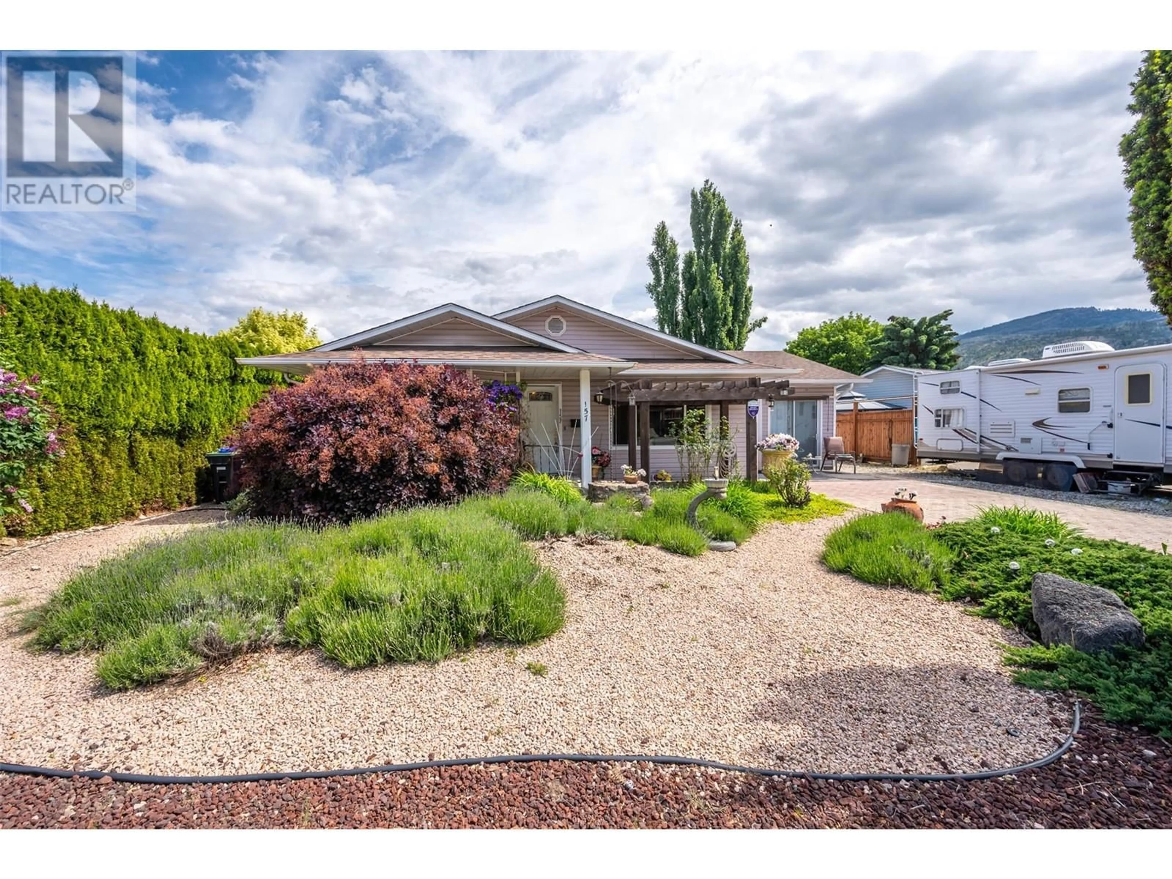 A pic from outside/outdoor area/front of a property/back of a property/a pic from drone, street for 157 AYRES CRESCENT, Penticton British Columbia V2A6R3