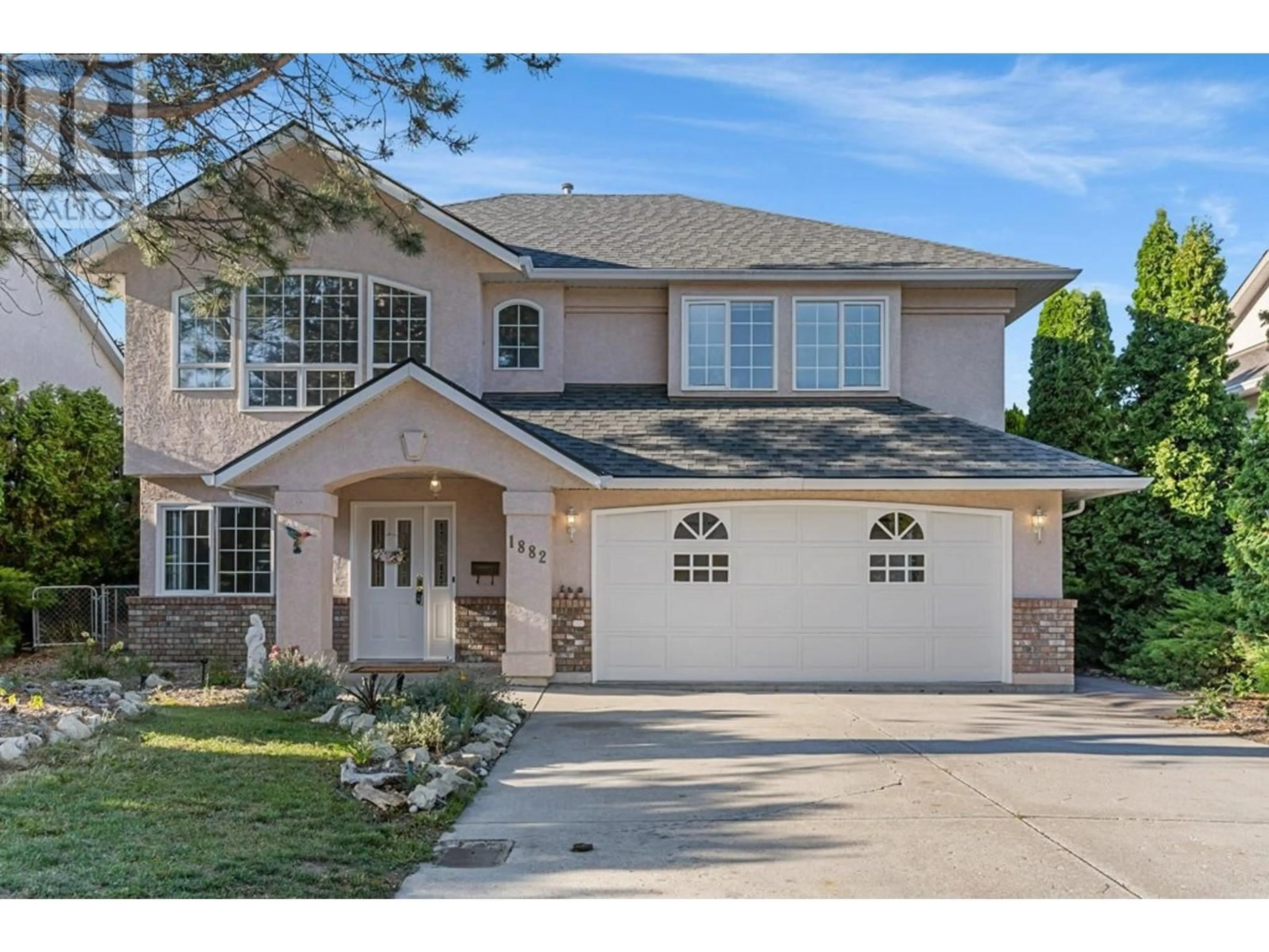 Home with brick exterior material, street for 1882 RANCHMONT CRESCENT, Kelowna British Columbia V1V1T3