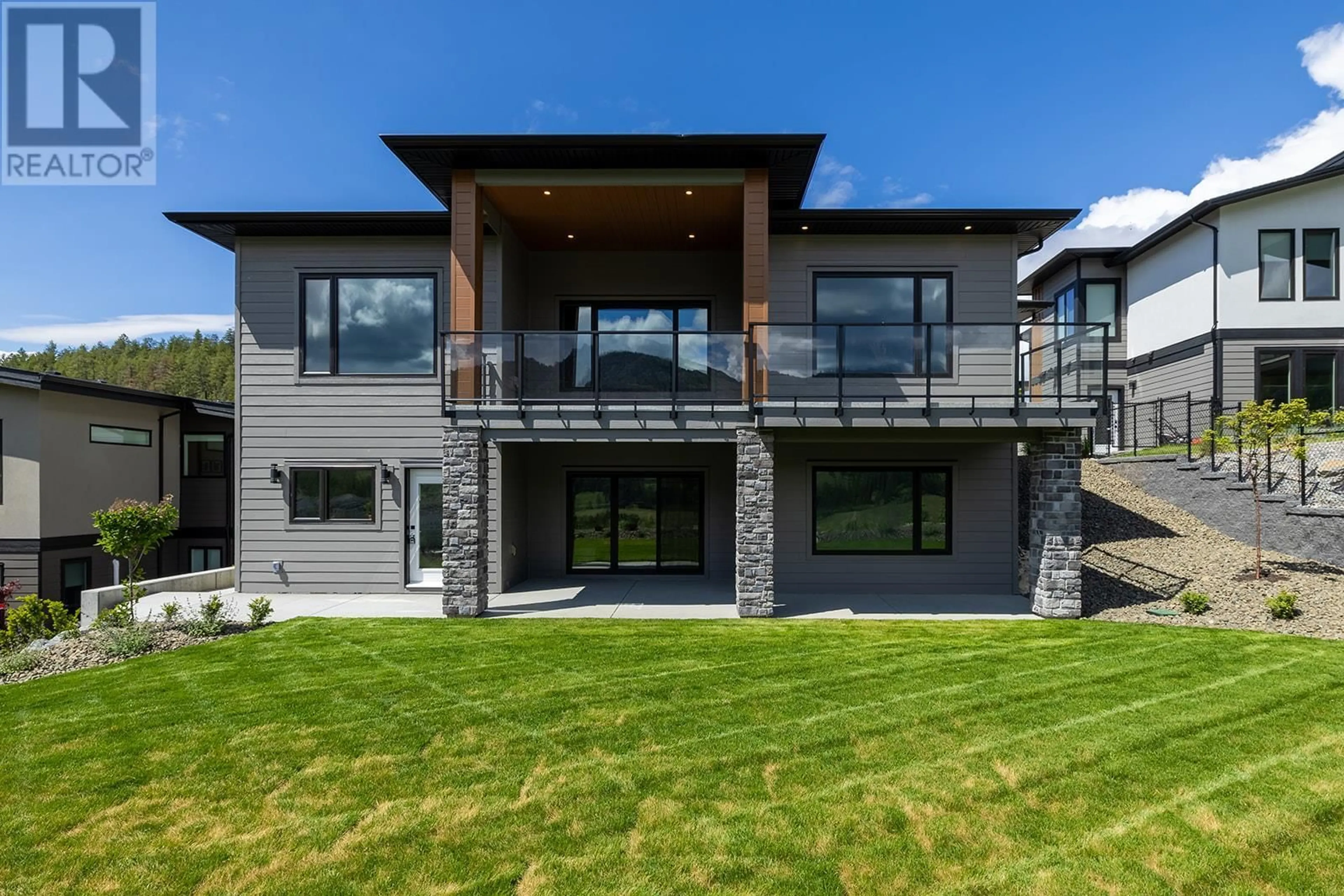 Home with brick exterior material, mountain view for 771 CARNOUSTIE DRIVE, Kelowna British Columbia V1P0A3