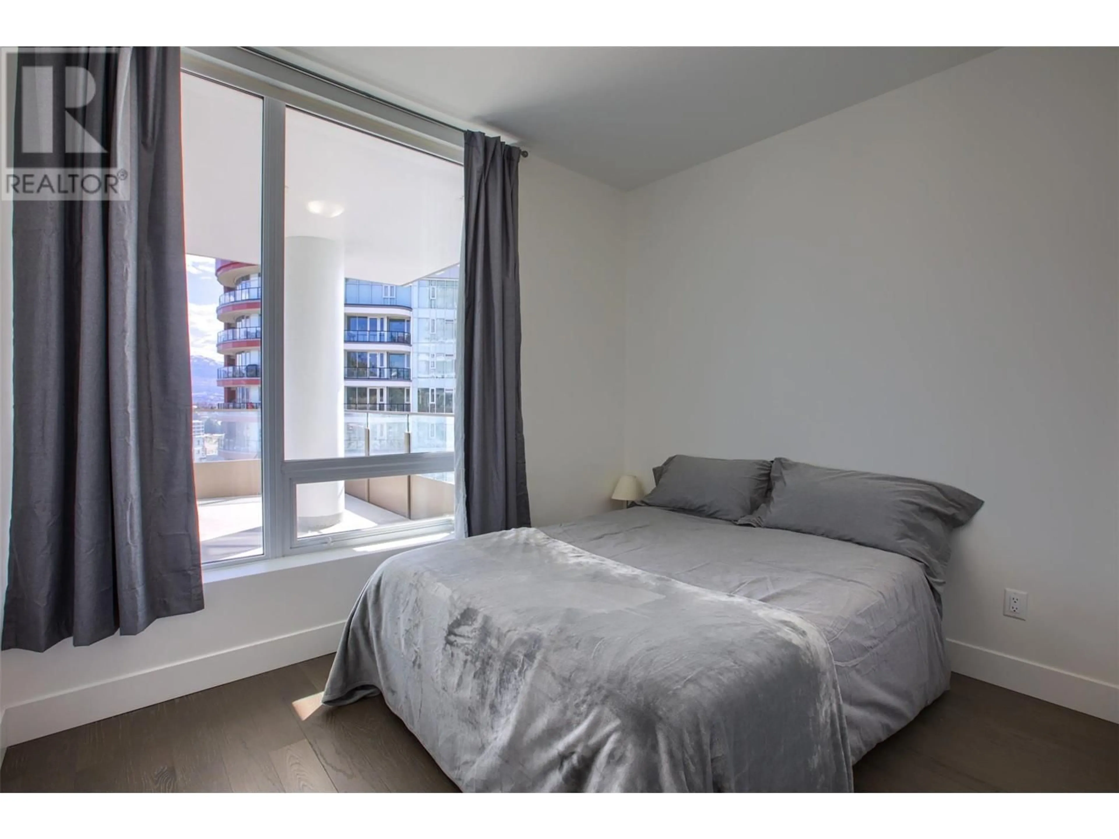 Bedroom with bed, unknown for 1102 - 1191 SUNSET DRIVE, Kelowna British Columbia V1Y0J4