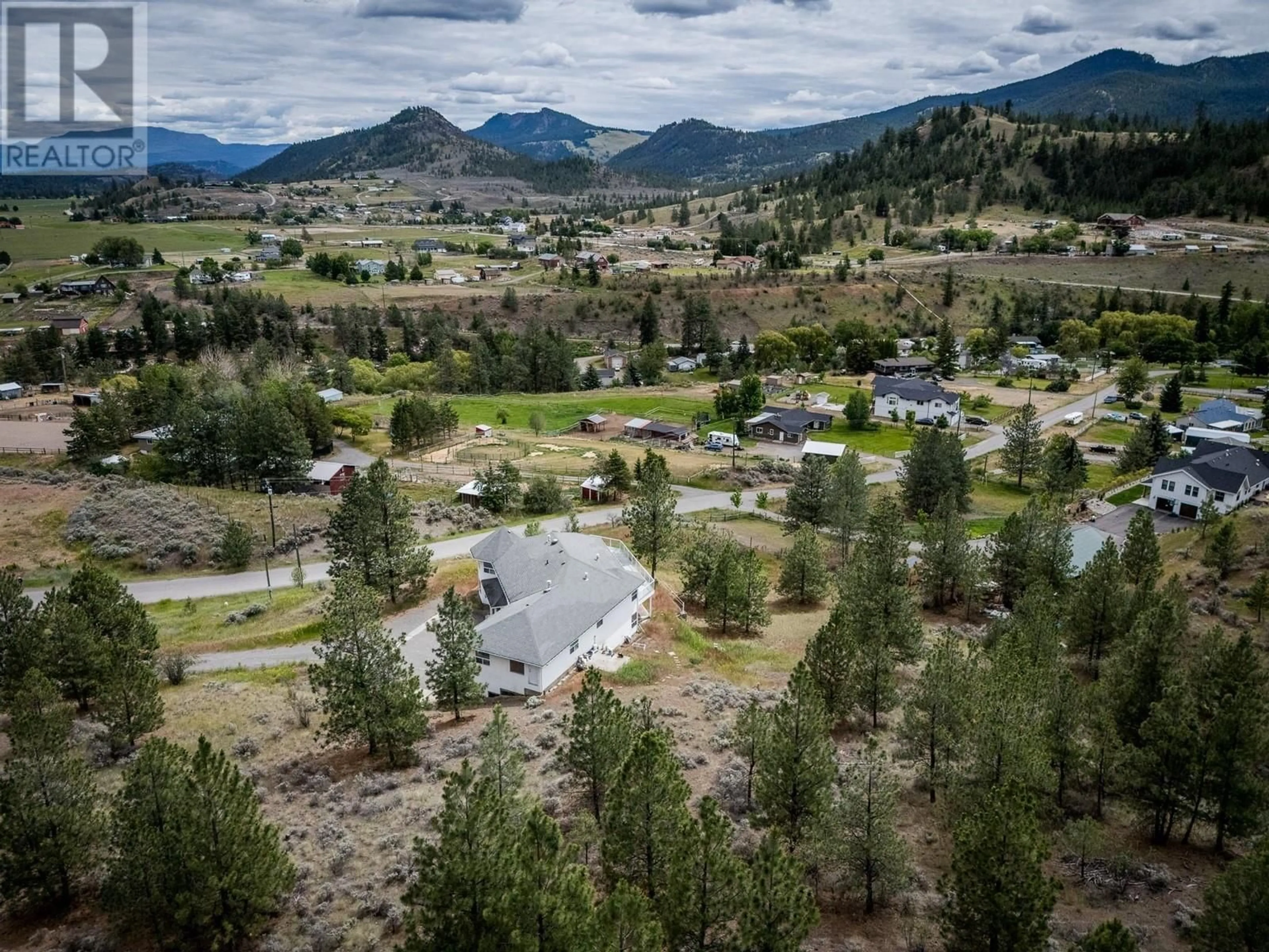 A pic from outside/outdoor area/front of a property/back of a property/a pic from drone, mountain view for 7035 BLACKWELL ROAD, Kamloops British Columbia V2C6V8