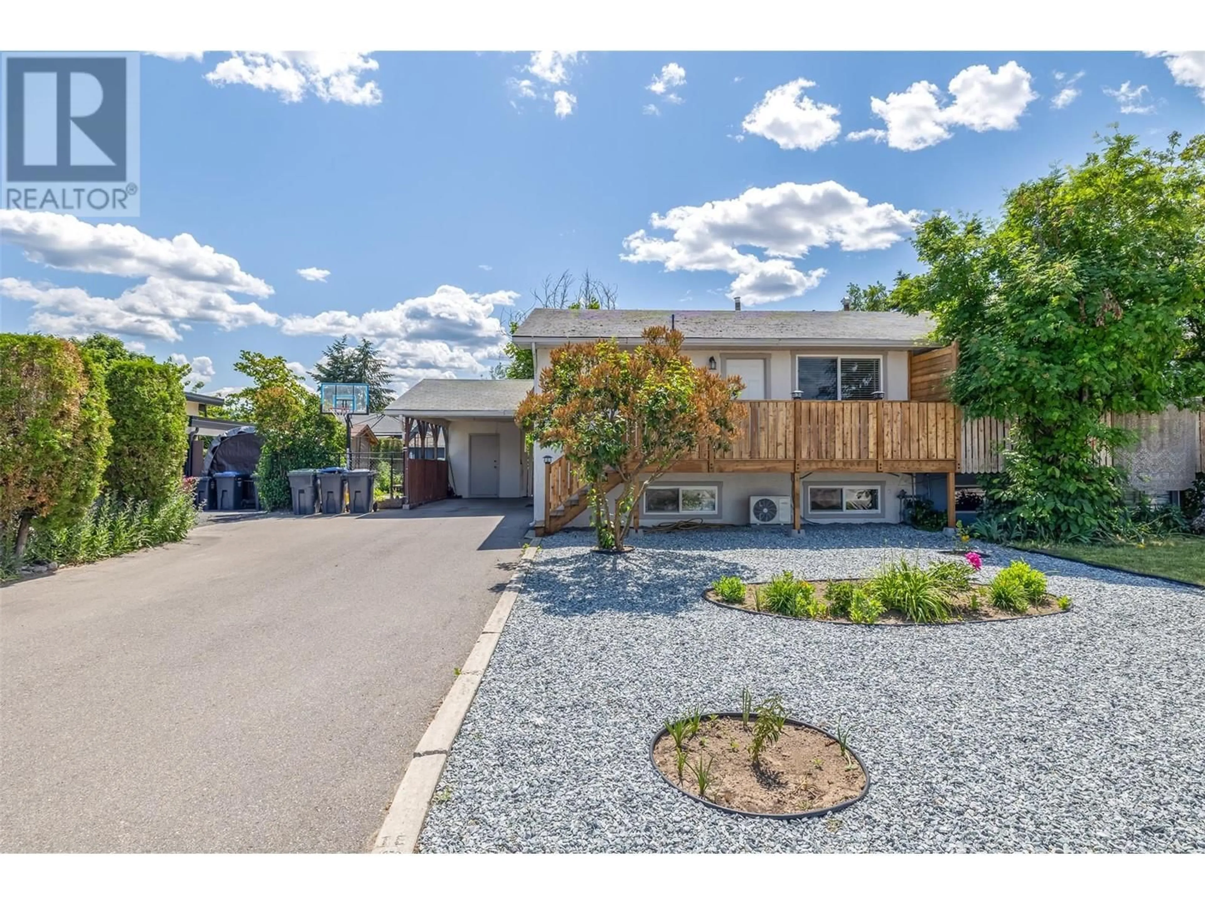 A pic from outside/outdoor area/front of a property/back of a property/a pic from drone, street for 387 MUGFORD ROAD, Kelowna British Columbia V1X2E5