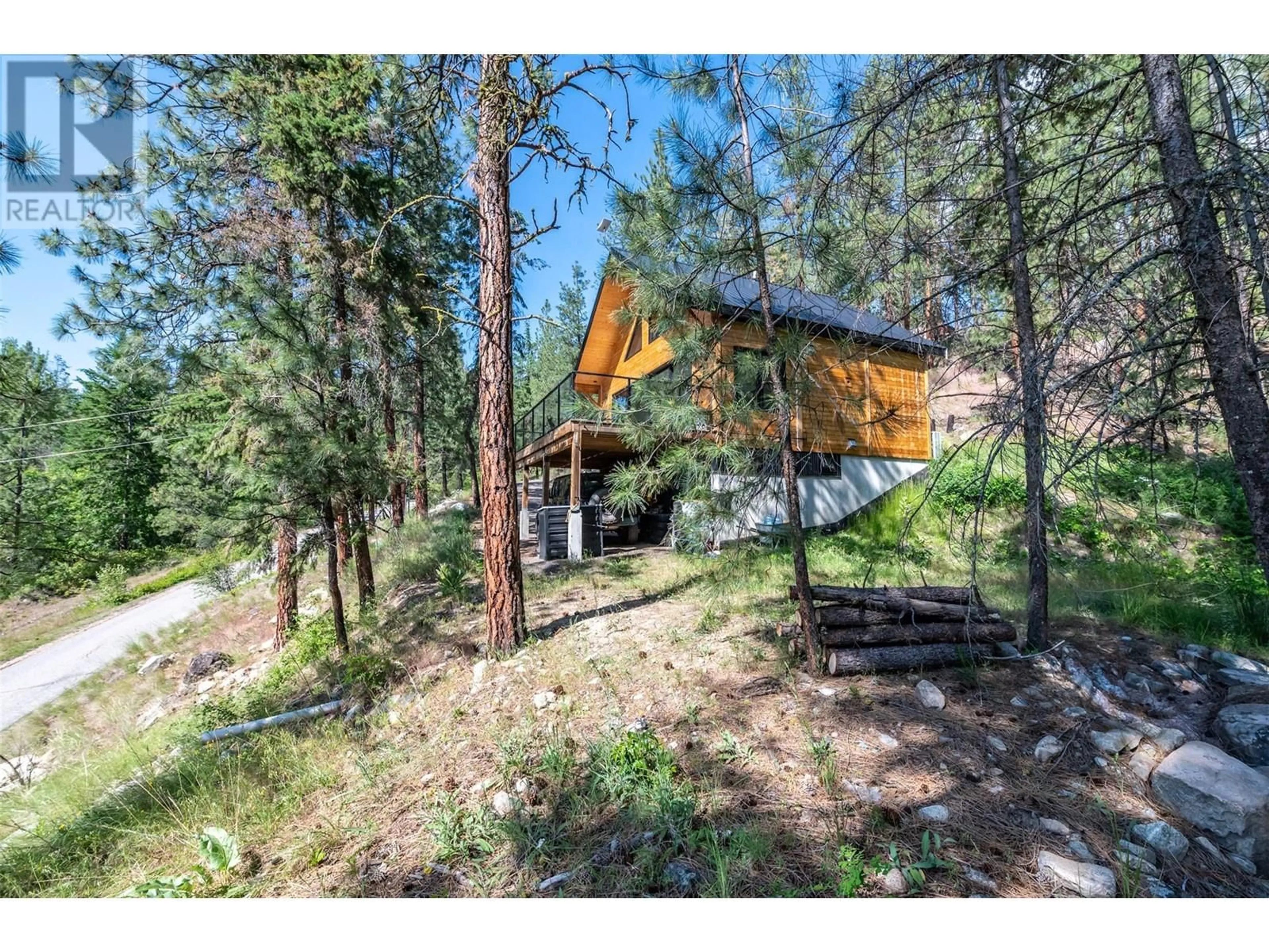 A pic from outside/outdoor area/front of a property/back of a property/a pic from drone, forest/trees view for 456 MATHESON ROAD, Okanagan Falls British Columbia V0H1R5