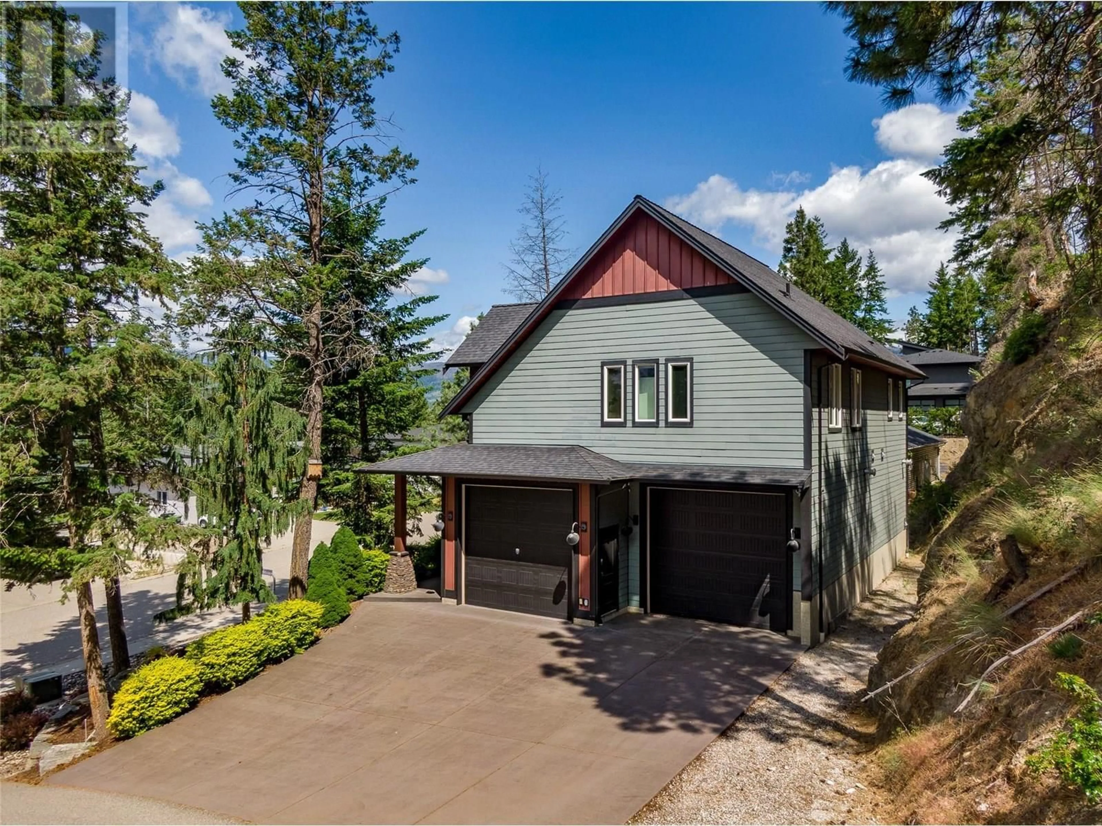 A pic from outside/outdoor area/front of a property/back of a property/a pic from drone, street for 27 GARMISCH ROAD, Vernon British Columbia V1H2K1