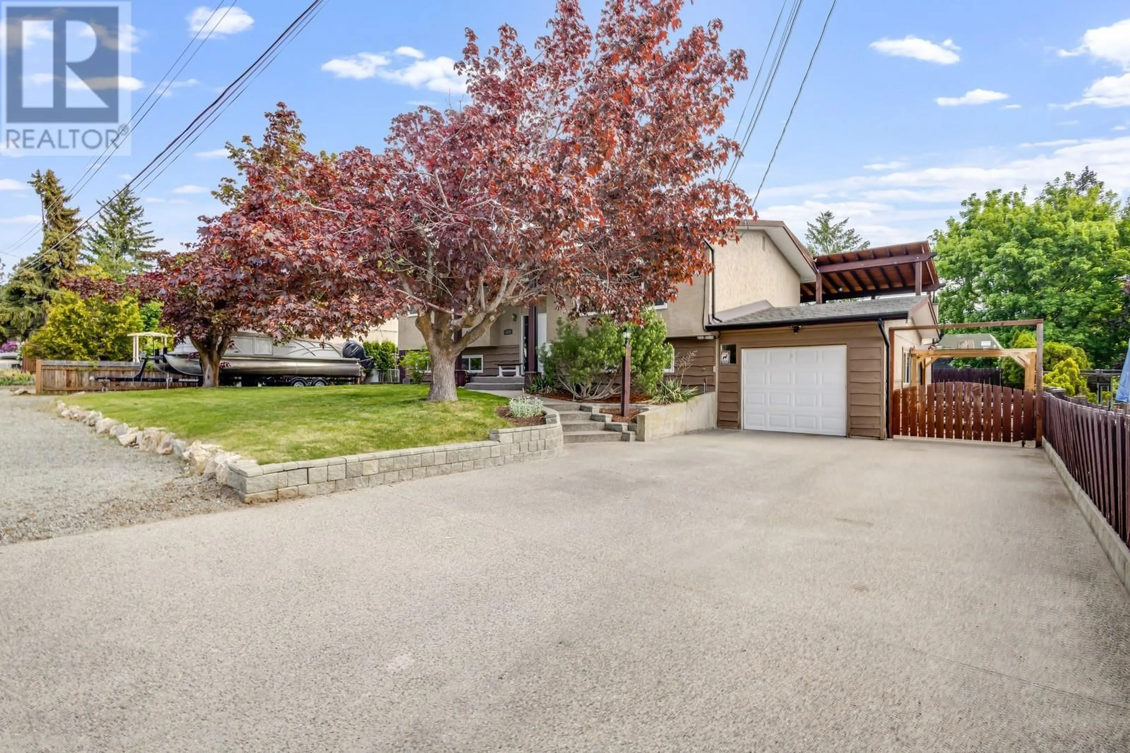 A pic from outside/outdoor area/front of a property/back of a property/a pic from drone, street for 3325 MCGREGOR ROAD, West Kelowna British Columbia V4T1G4