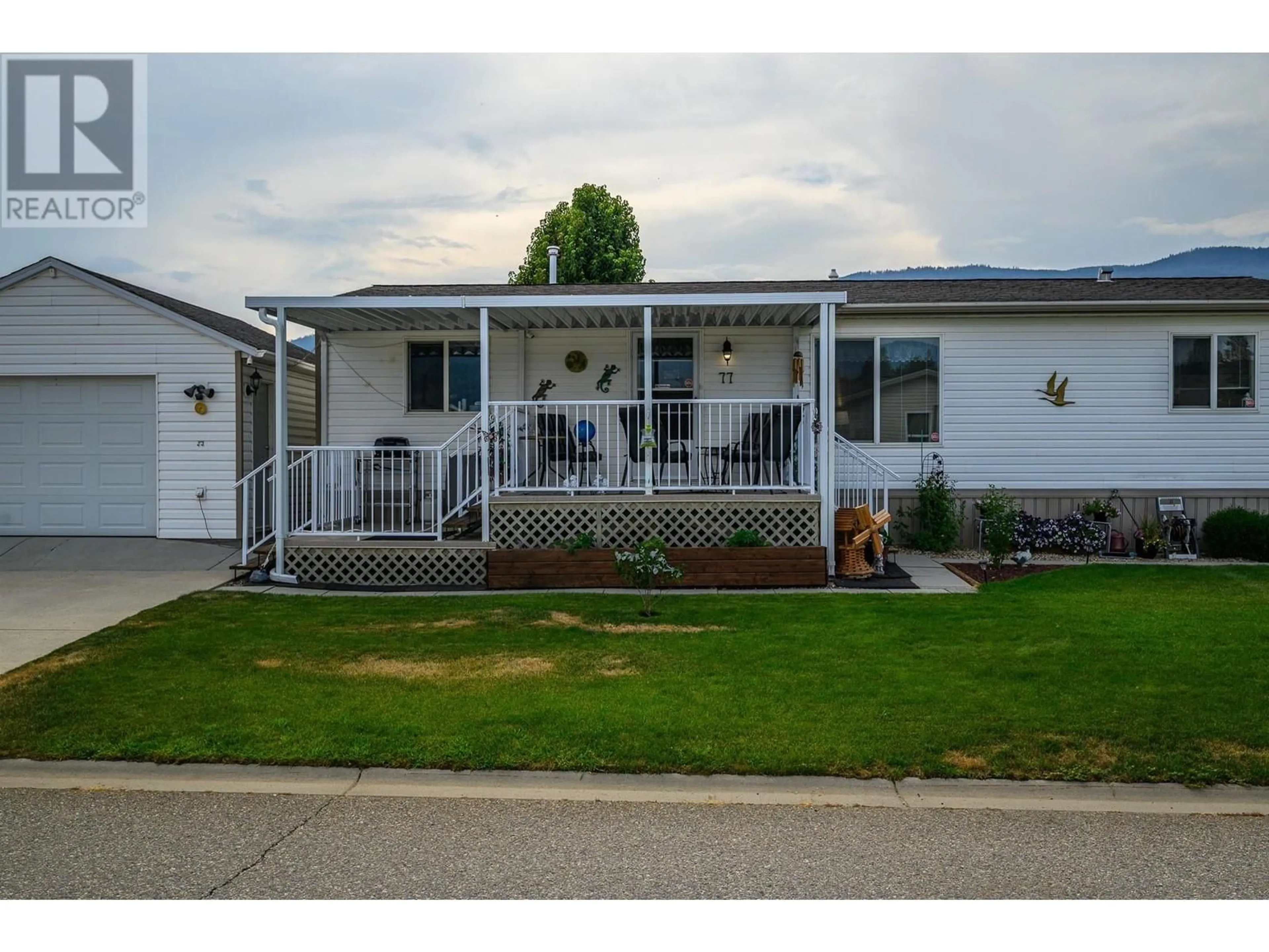 Home with vinyl exterior material, street for 77 - 12560 WESTSIDE ROAD, Vernon British Columbia V1H1S9