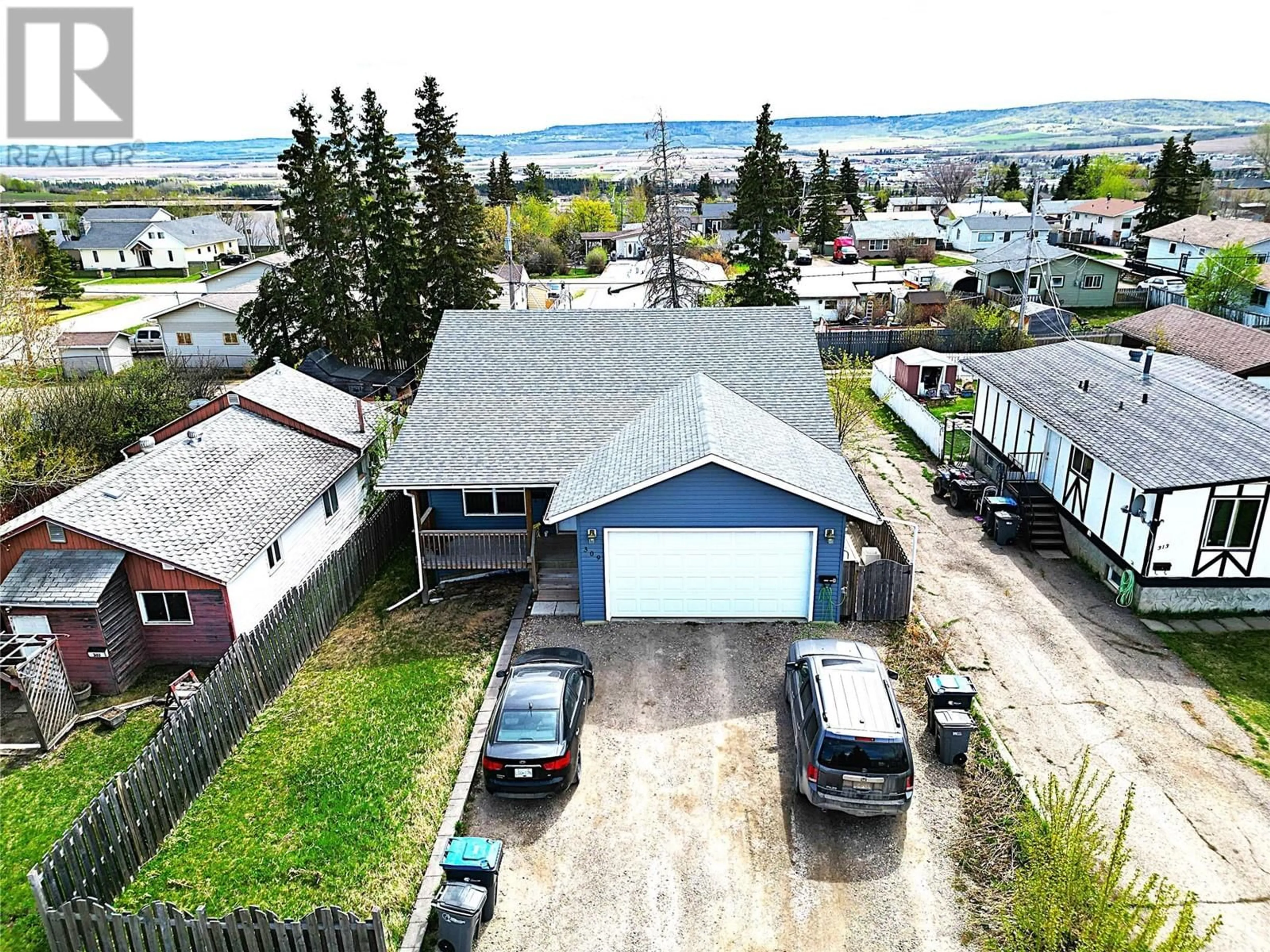 A pic from outside/outdoor area/front of a property/back of a property/a pic from drone, unknown for 309 99 AVENUE, Dawson Creek British Columbia V1G1T1