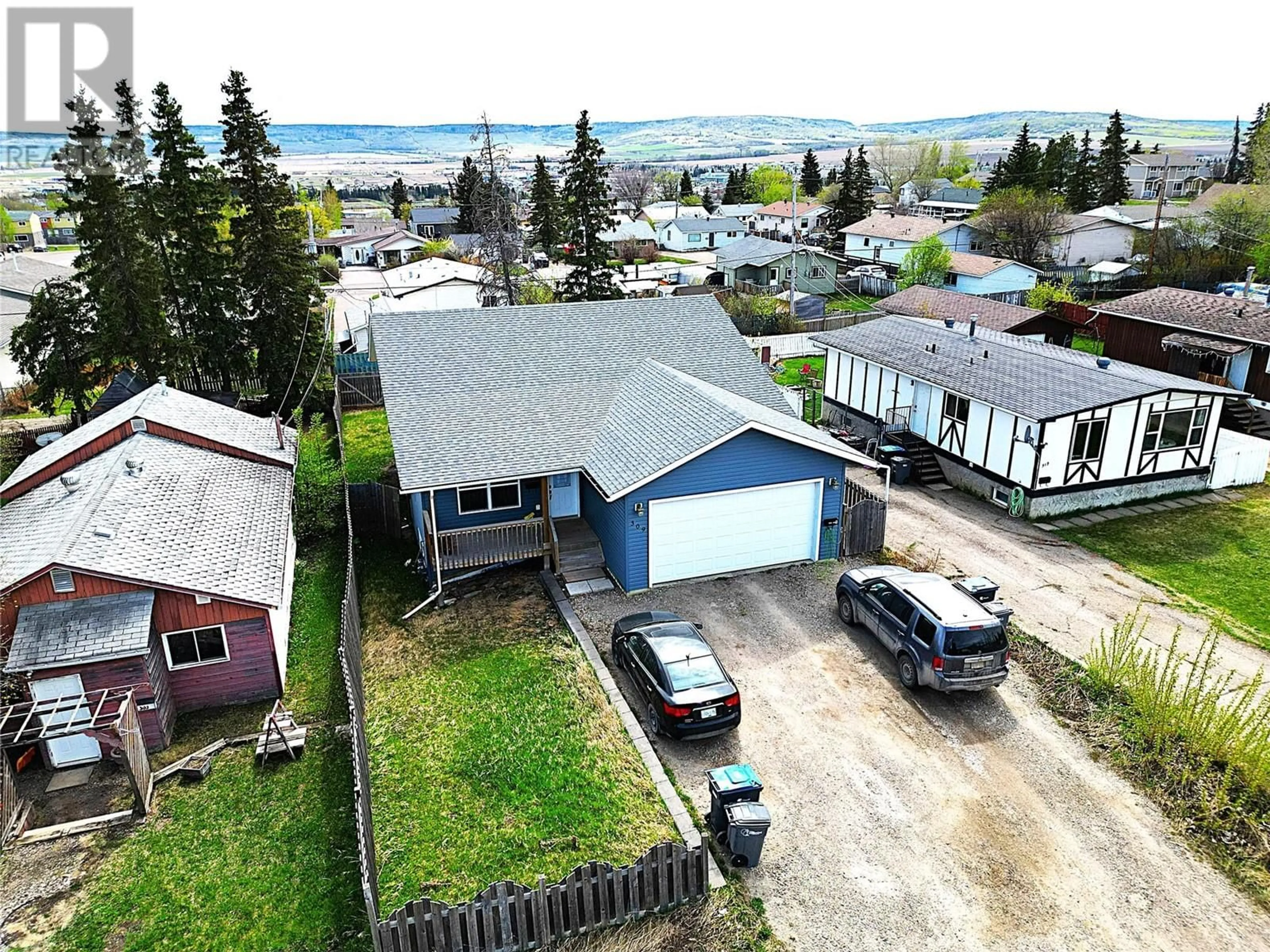 A pic from outside/outdoor area/front of a property/back of a property/a pic from drone, unknown for 309 99 AVENUE, Dawson Creek British Columbia V1G1T1