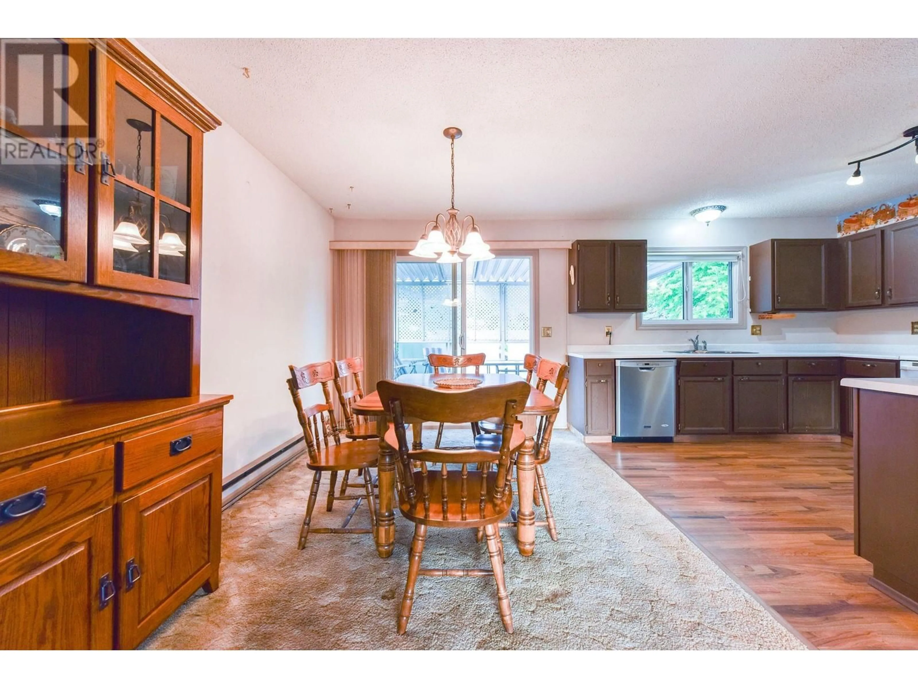 Open concept kitchen, wood/laminate floor for 176 CHAMBERS PLACE, Penticton British Columbia V2A6T7