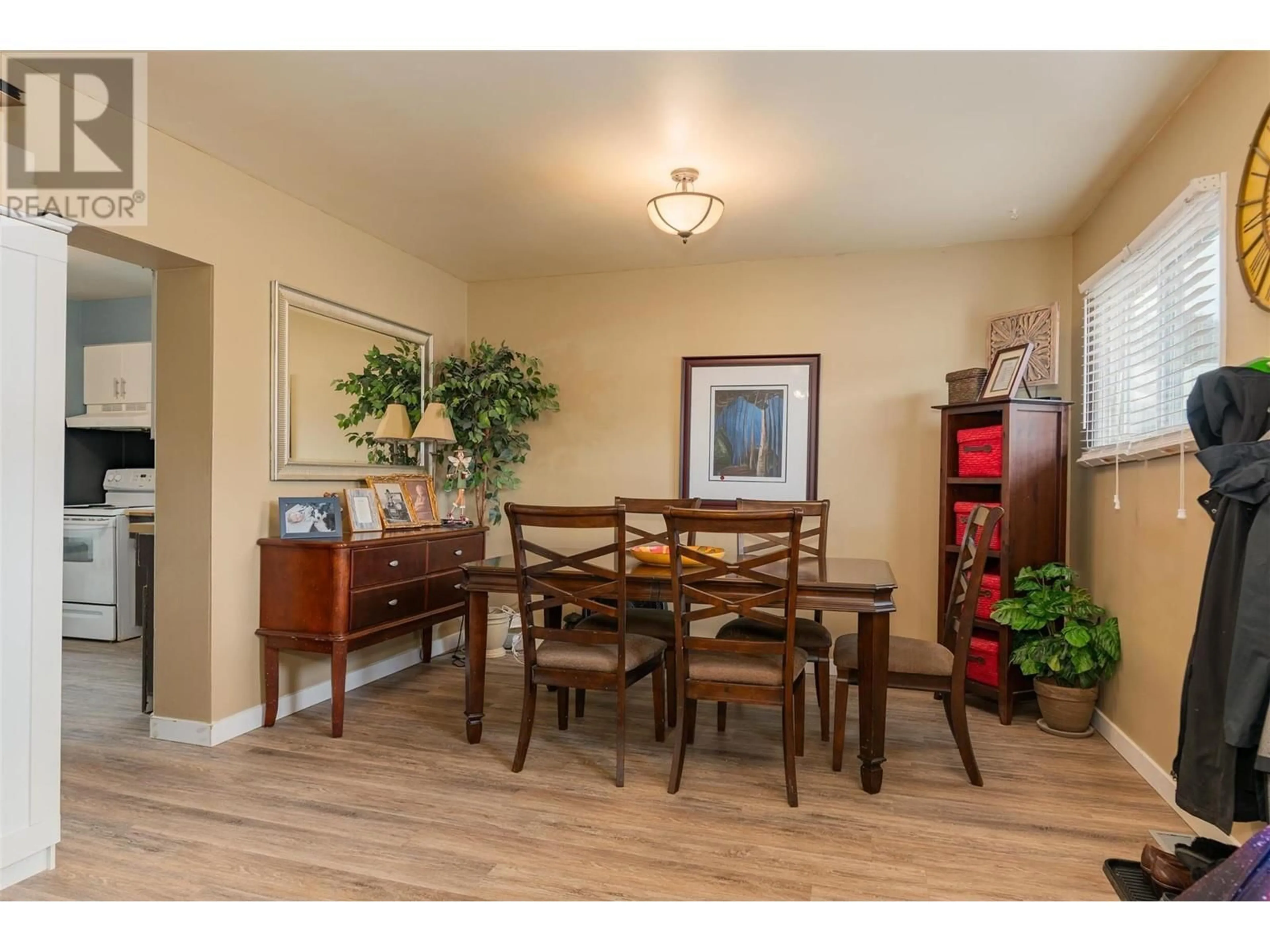 Dining room, wood/laminate floor for 1569 COLUMBIA AVENUE, Trail British Columbia V1R1K1