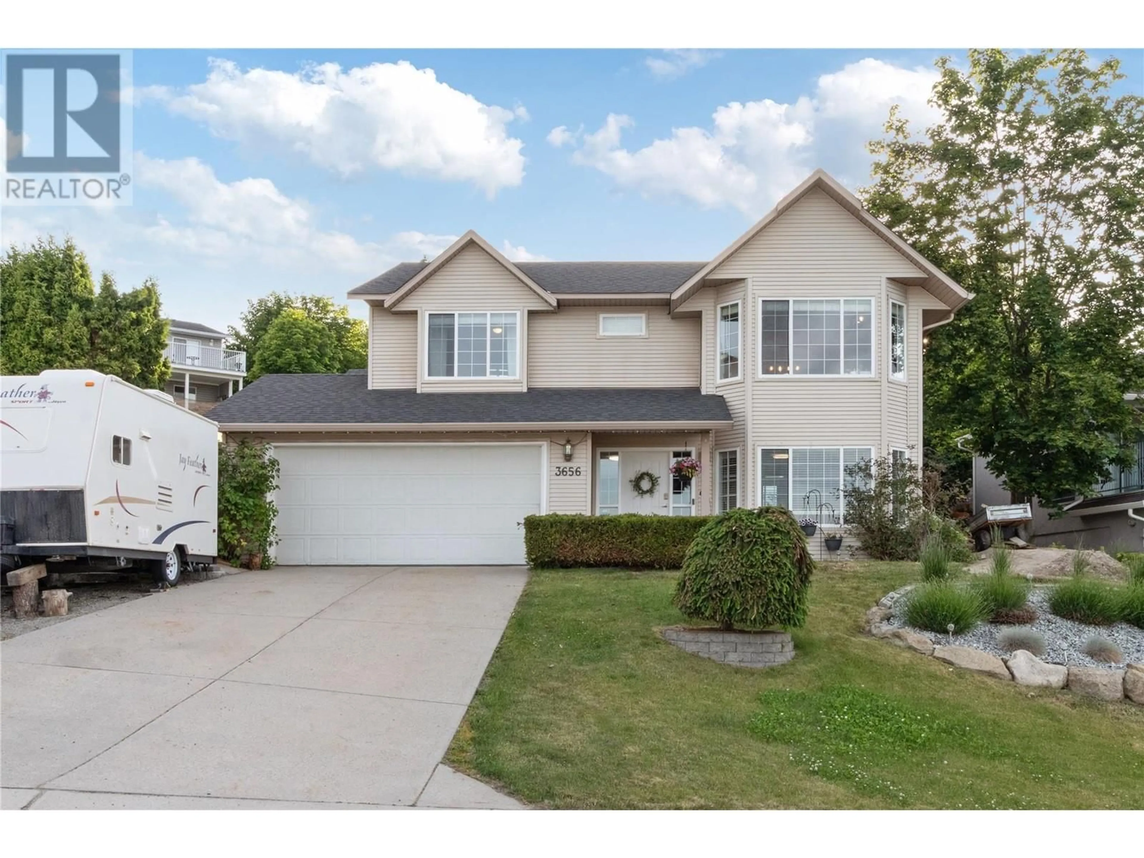 Home with vinyl exterior material, street for 3656 WALNUT GLEN DRIVE, West Kelowna British Columbia V4T2R7