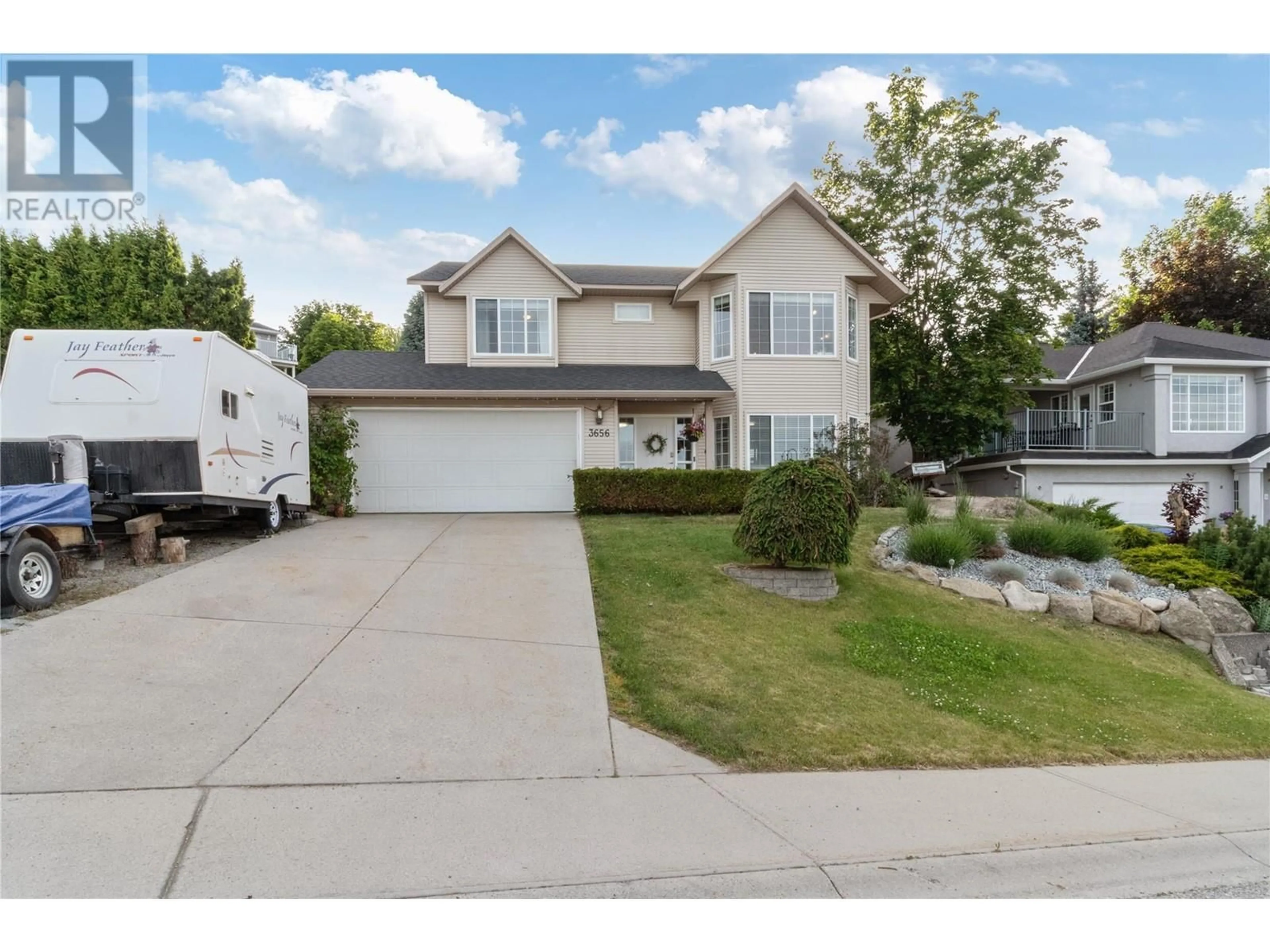 Home with vinyl exterior material, street for 3656 WALNUT GLEN DRIVE, West Kelowna British Columbia V4T2R7