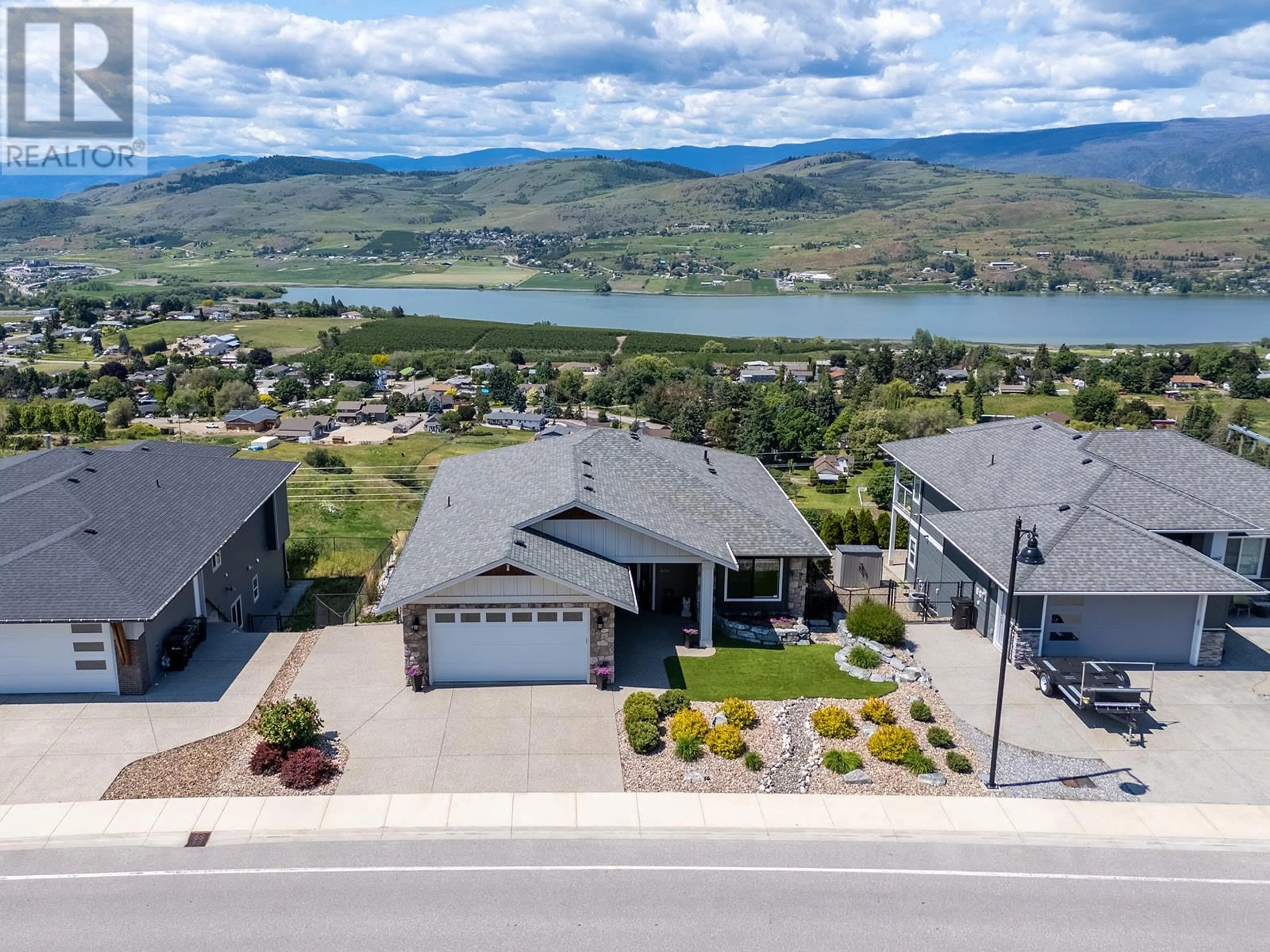 A pic from outside/outdoor area/front of a property/back of a property/a pic from drone, water/lake/river/ocean view for 6658 BLACKCOMB WAY, Vernon British Columbia V1B4E1