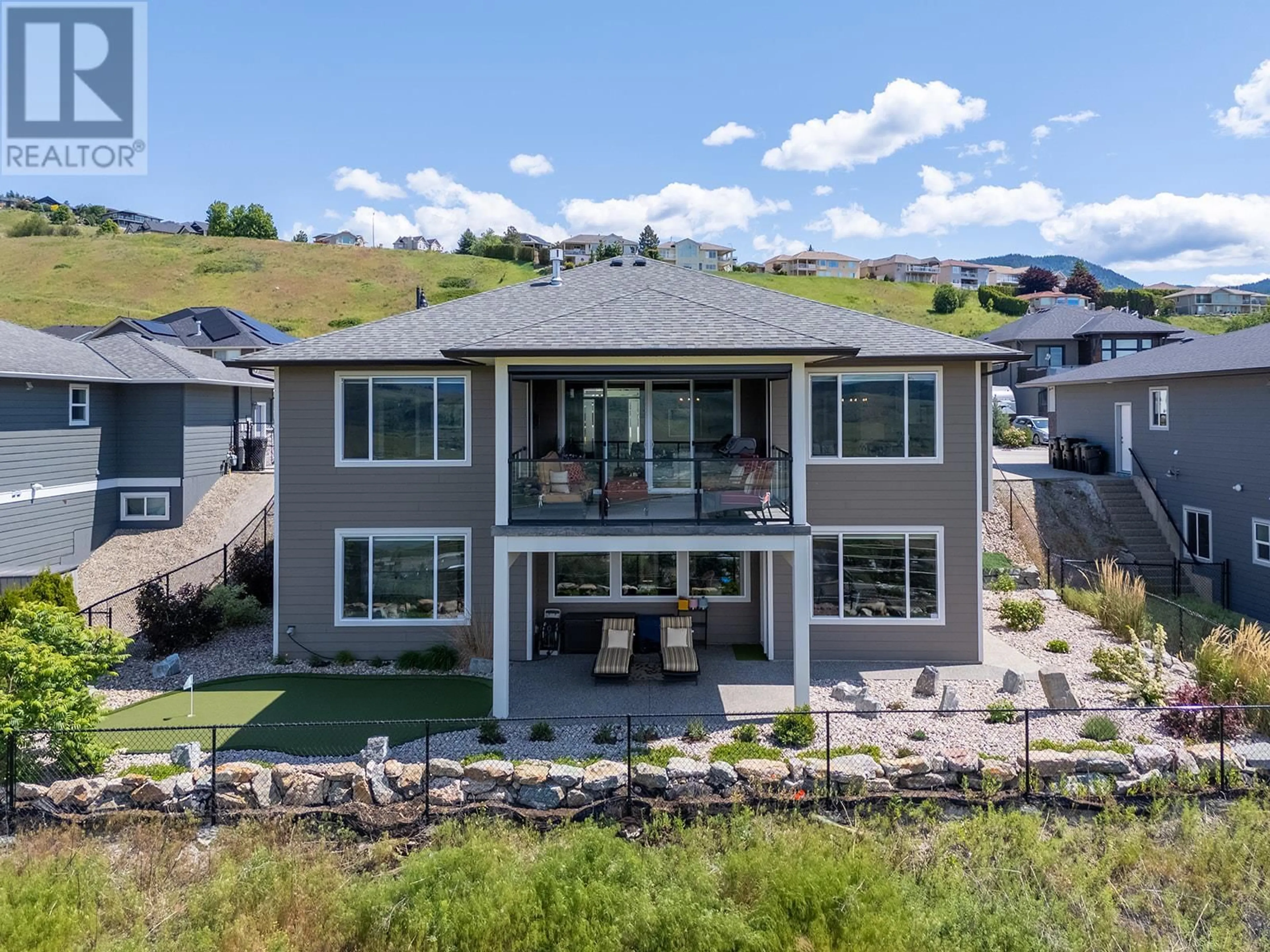 A pic from outside/outdoor area/front of a property/back of a property/a pic from drone, mountain view for 6658 BLACKCOMB WAY, Vernon British Columbia V1B4E1