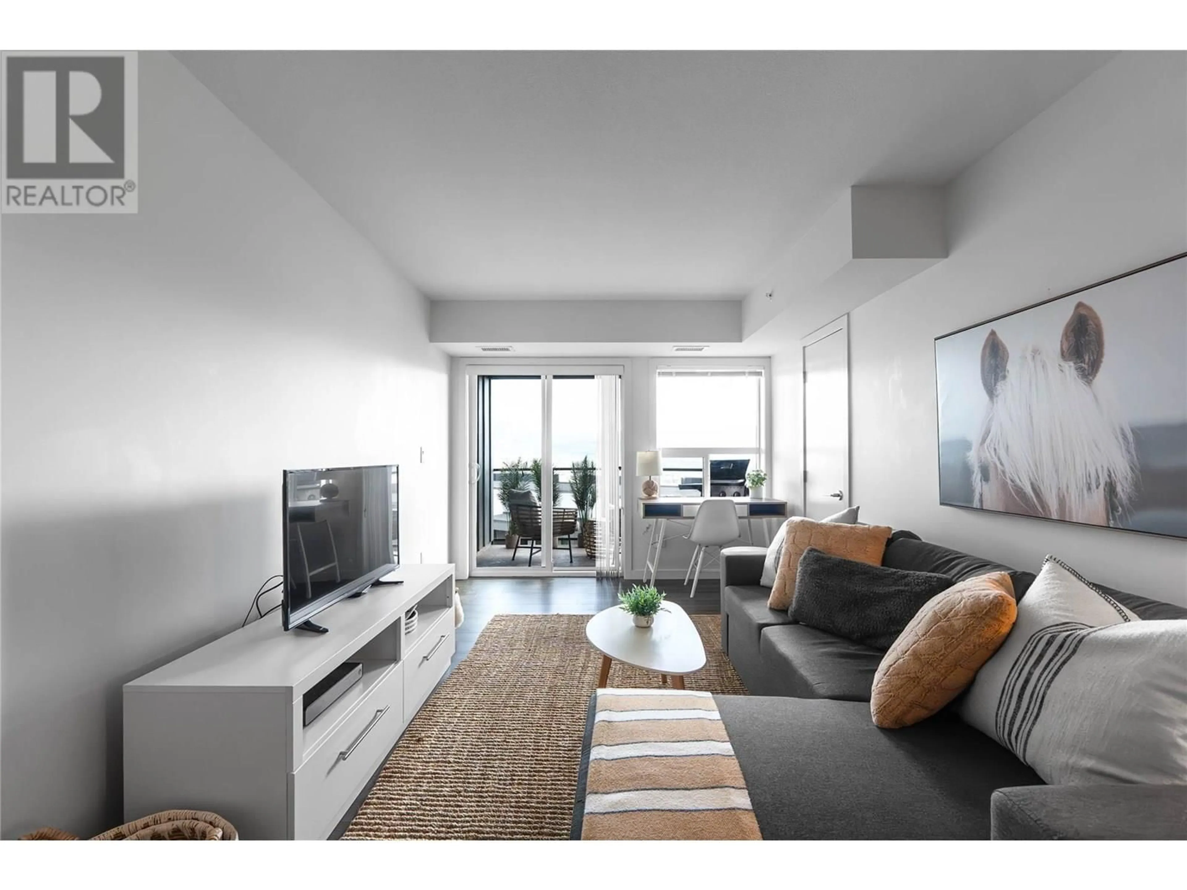 Living room with furniture, unknown for PH21 - 775 ACADEMY WAY, Kelowna British Columbia V1V0A5