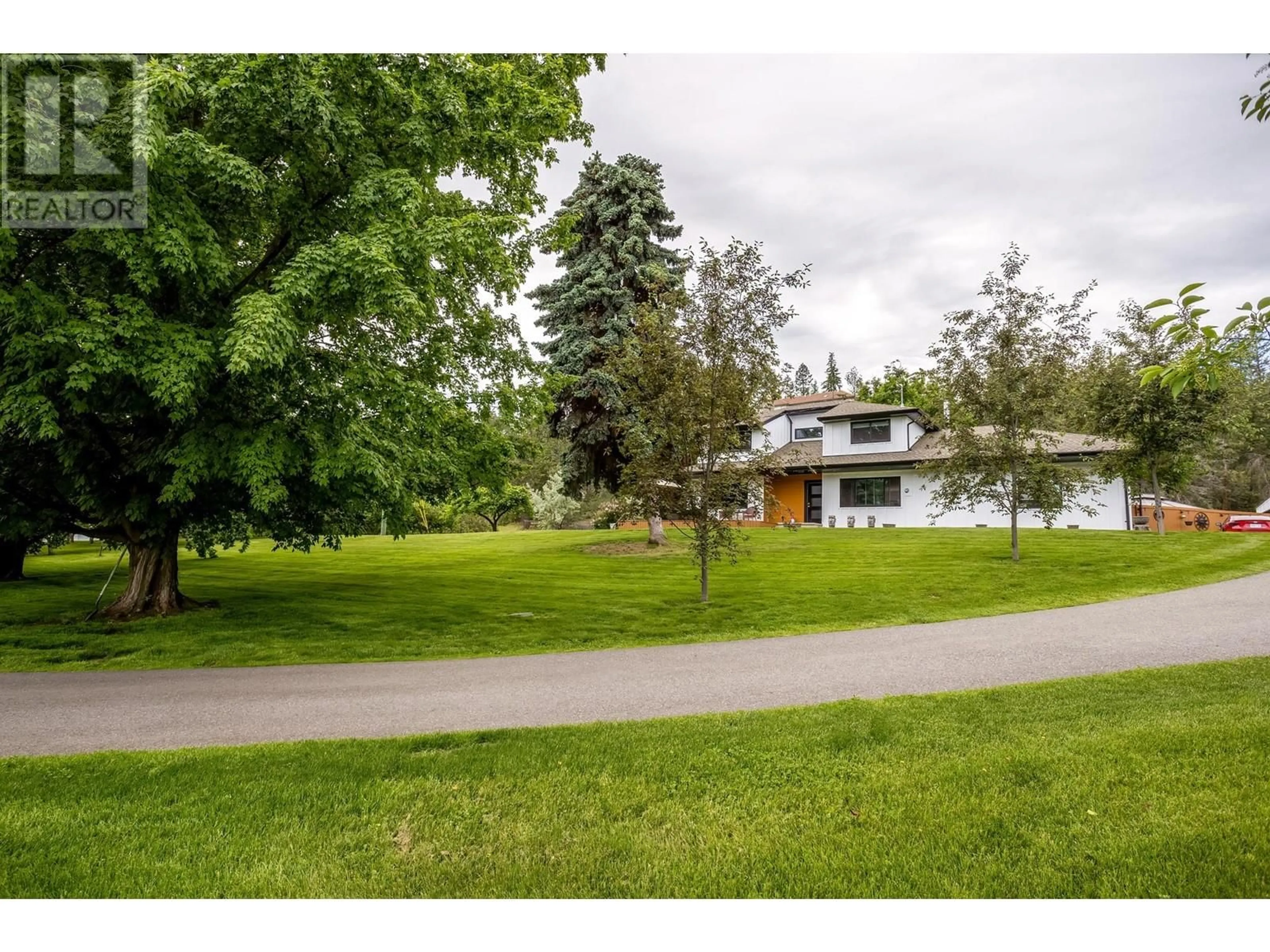 A pic from outside/outdoor area/front of a property/back of a property/a pic from drone, street for 2132 MONTE CARLO ROAD, Lake Country British Columbia V4V1K6