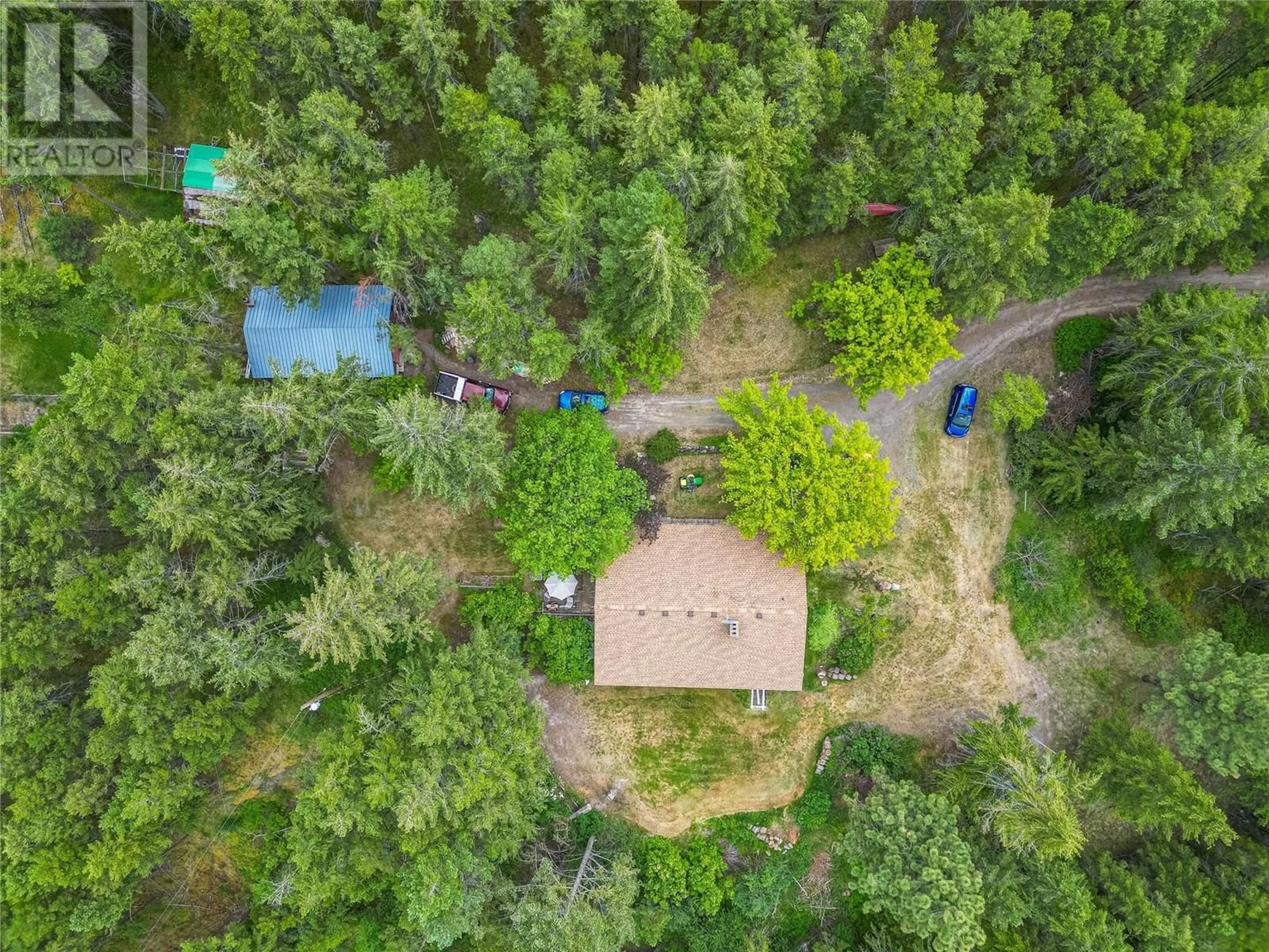 A pic from outside/outdoor area/front of a property/back of a property/a pic from drone, forest/trees view for 5460 BACK ROAD, Westwold British Columbia V0E3B1