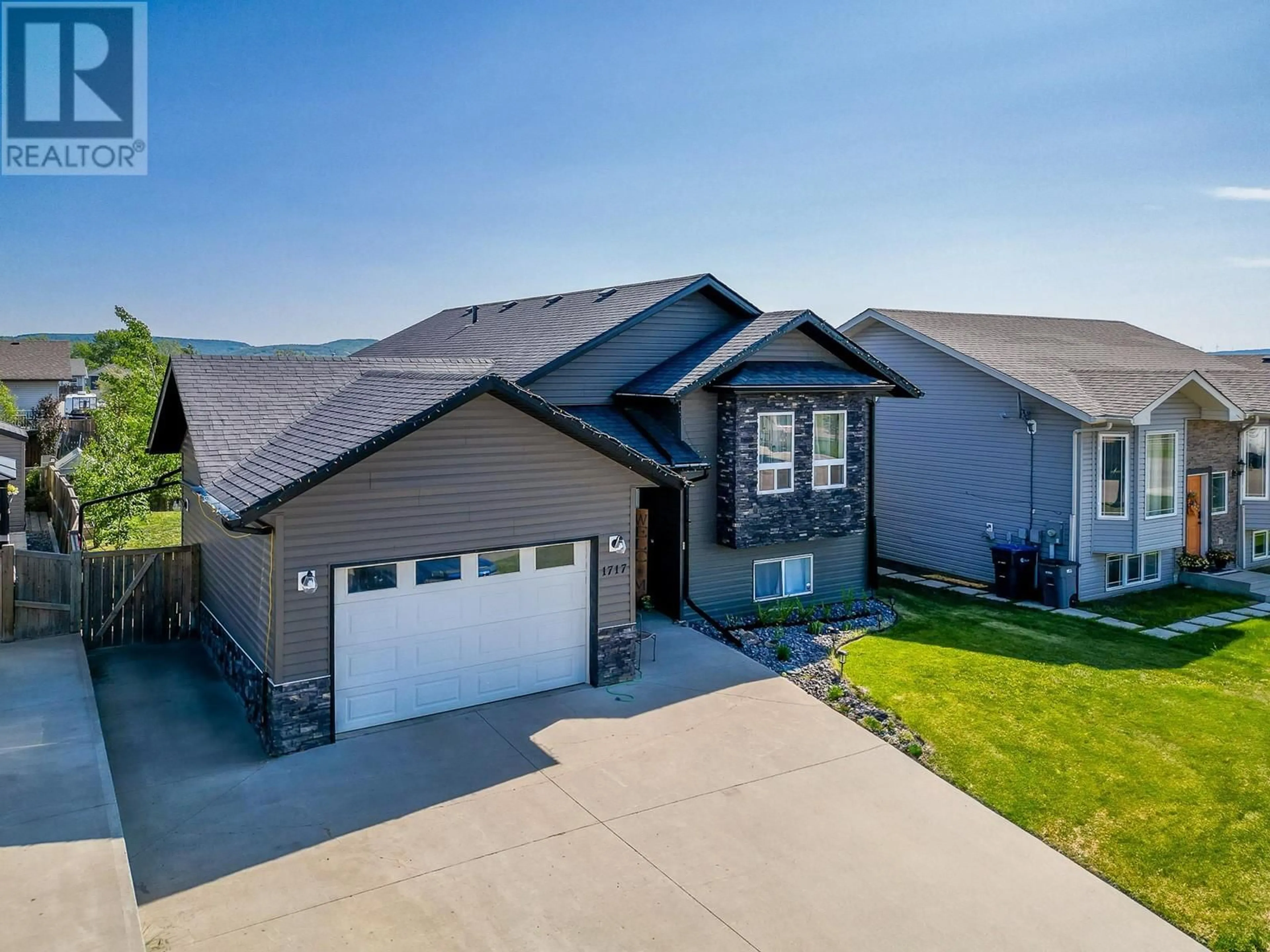 A pic from outside/outdoor area/front of a property/back of a property/a pic from drone, unknown for 1717 86 AVENUE, Dawson Creek British Columbia V1G0B2