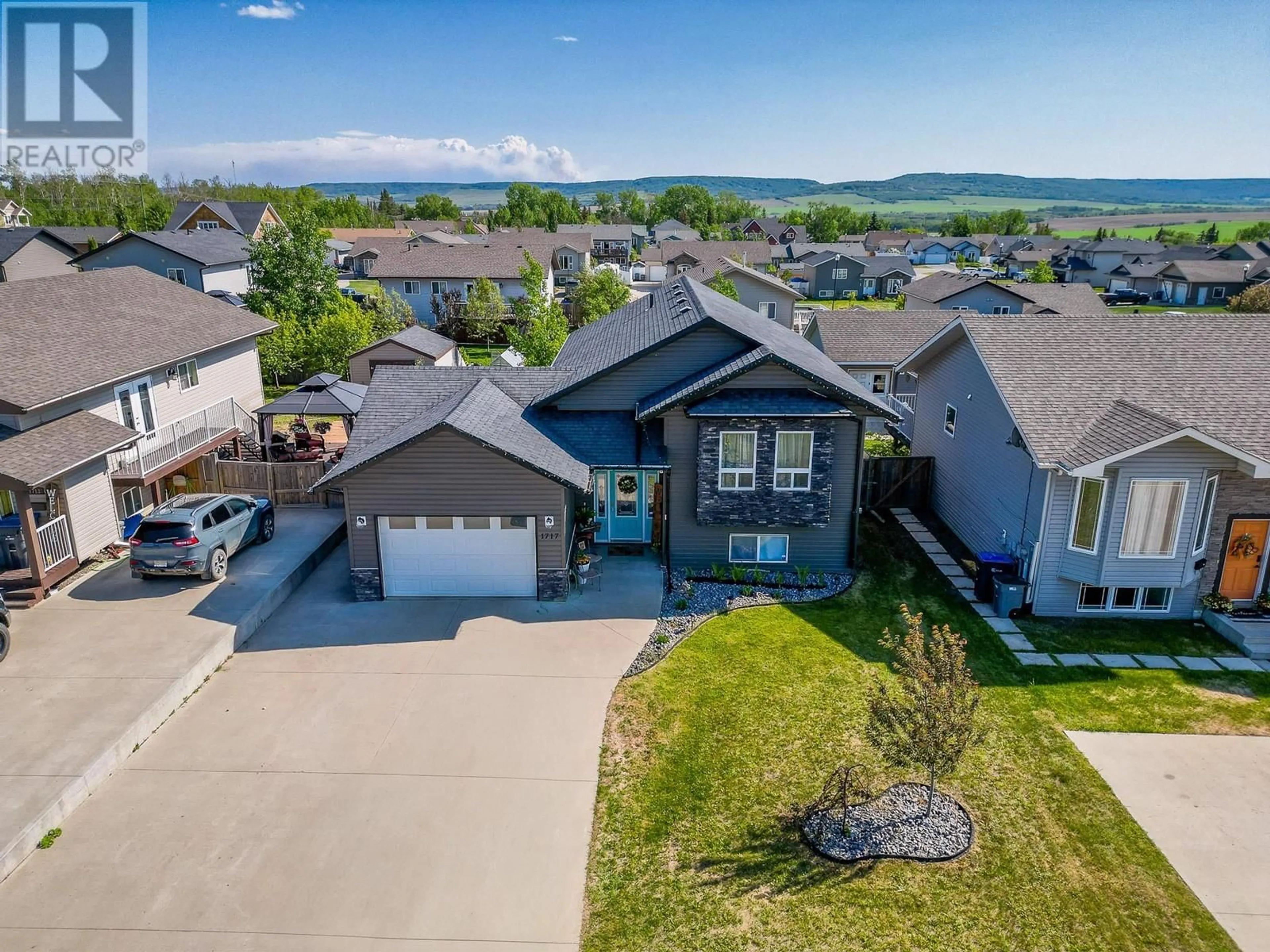 A pic from outside/outdoor area/front of a property/back of a property/a pic from drone, unknown for 1717 86 AVENUE, Dawson Creek British Columbia V1G0B2