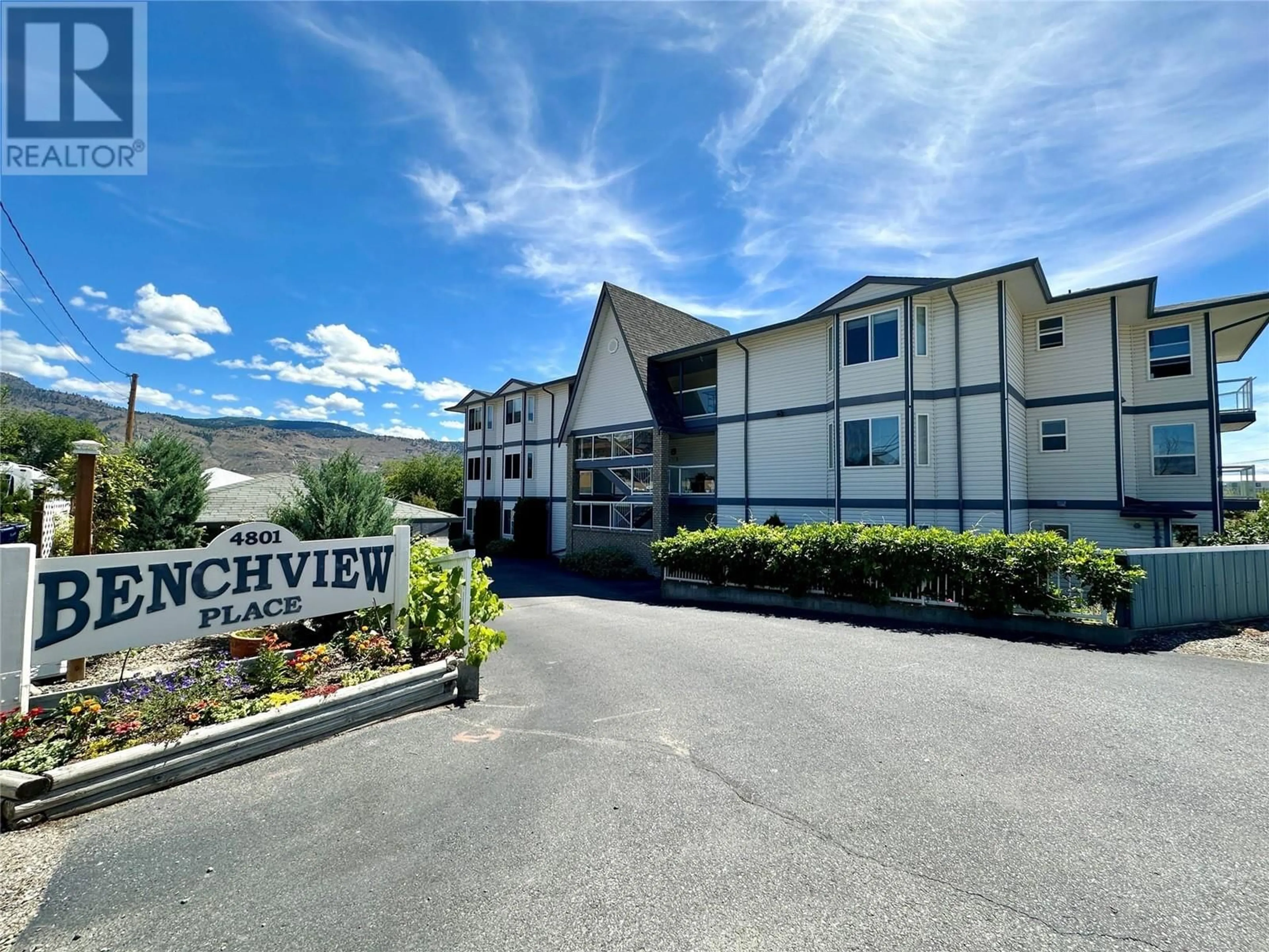 A pic from outside/outdoor area/front of a property/back of a property/a pic from drone, mountain view for 303 - 4801 89TH STREET, Osoyoos British Columbia V0H1V1