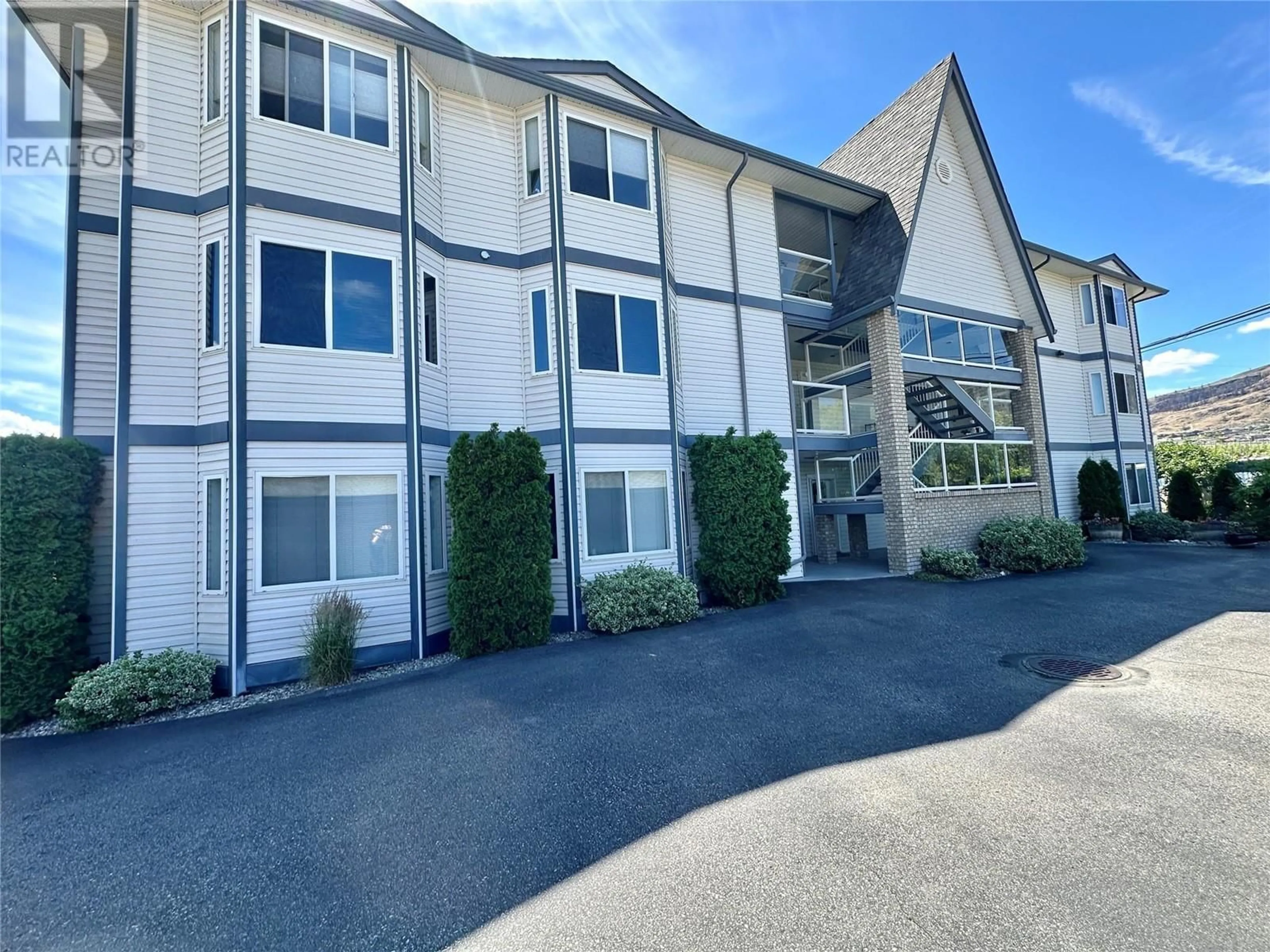 A pic from outside/outdoor area/front of a property/back of a property/a pic from drone, unknown for 303 - 4801 89TH STREET, Osoyoos British Columbia V0H1V1