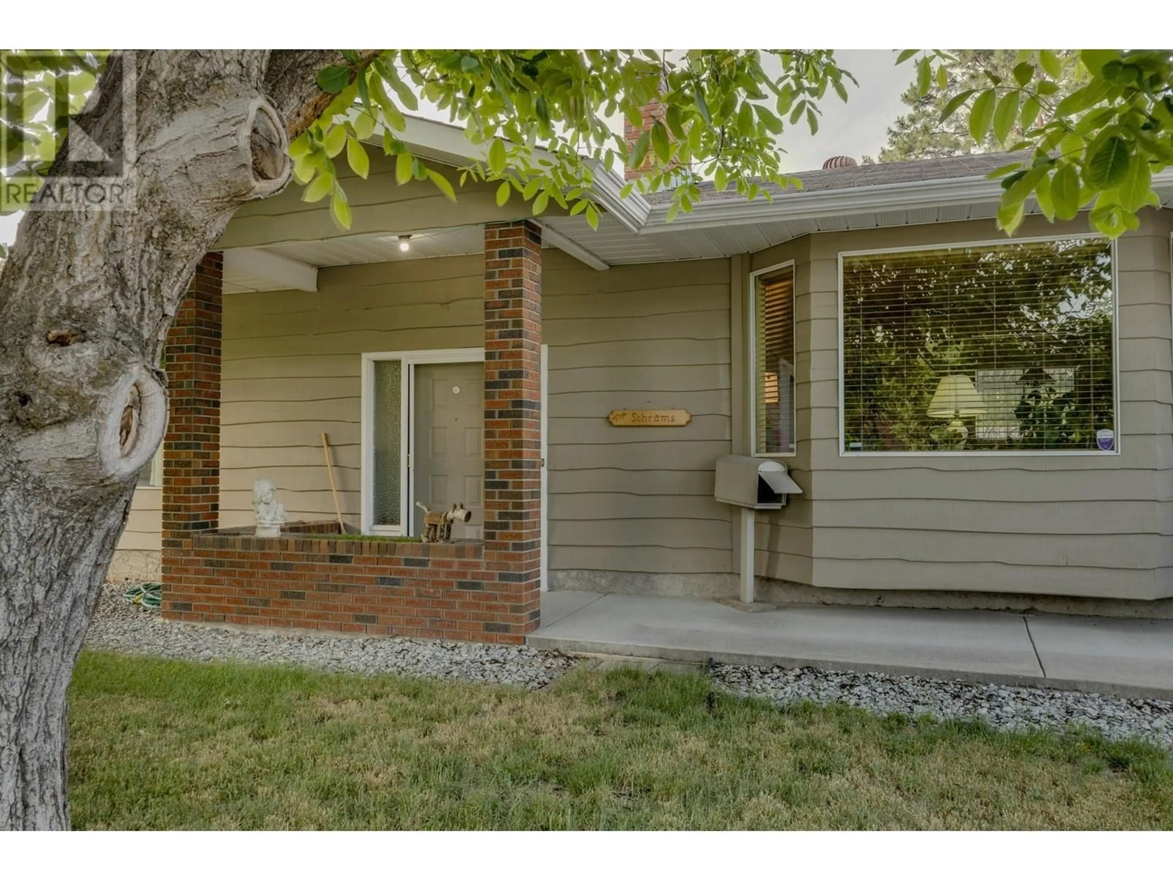 Home with brick exterior material, street for 1846 UPLAND AVENUE, Kelowna British Columbia V1Y4G7