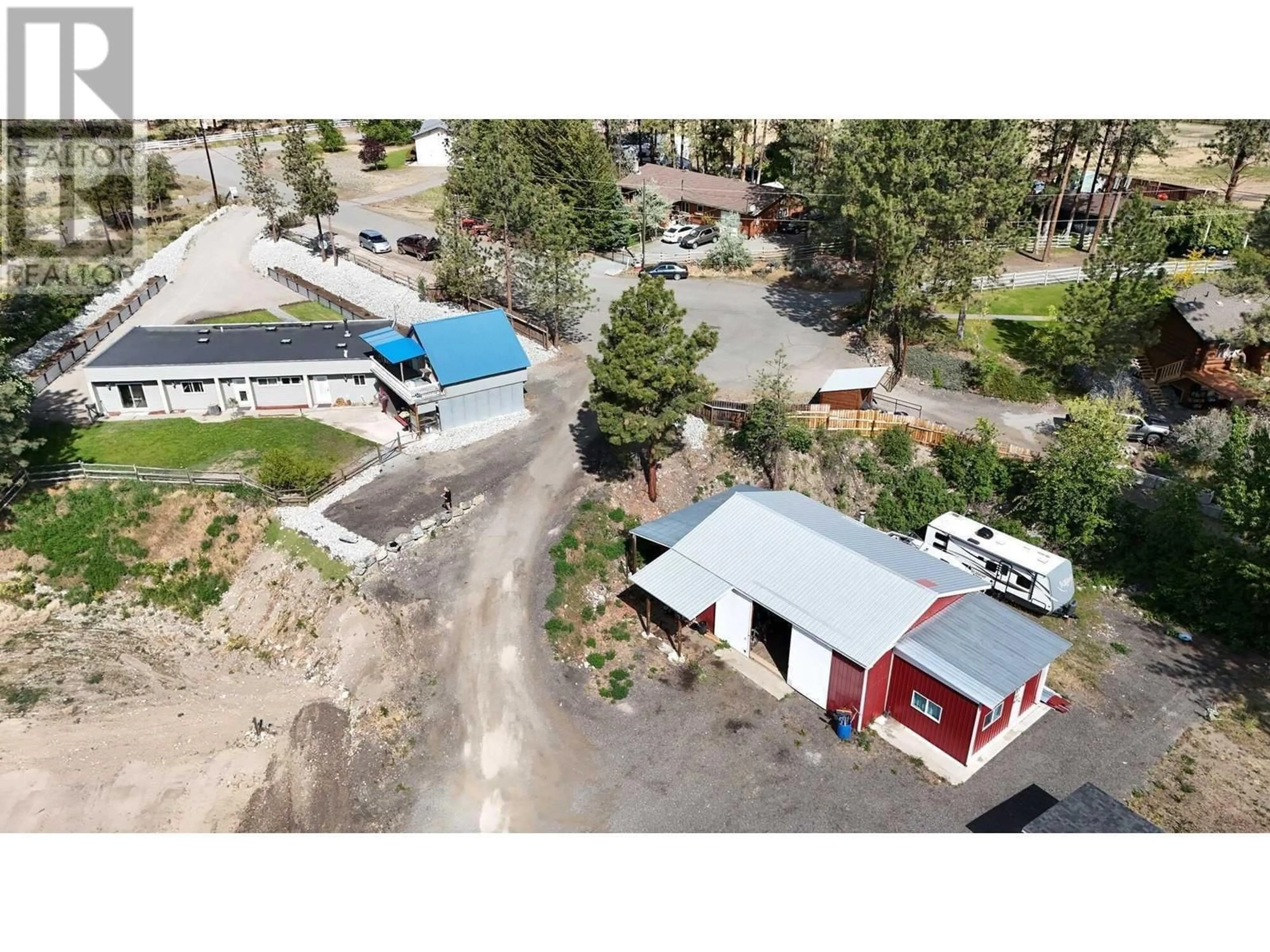 A pic from outside/outdoor area/front of a property/back of a property/a pic from drone, mountain view for 310 GUICHON AVENUE, Merritt British Columbia V0K1Y0
