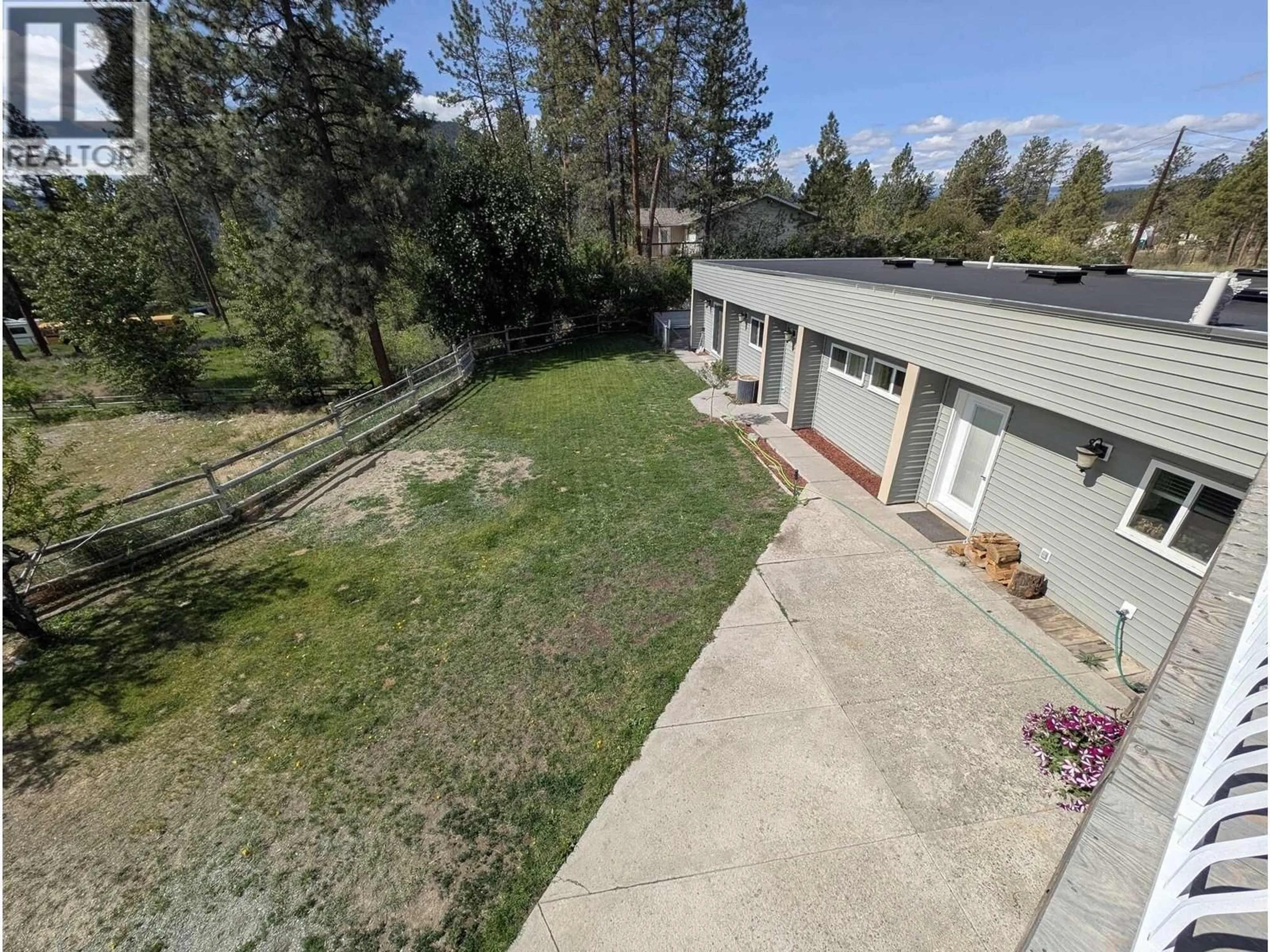 A pic from outside/outdoor area/front of a property/back of a property/a pic from drone, water/lake/river/ocean view for 310 GUICHON AVENUE, Merritt British Columbia V0K1Y0