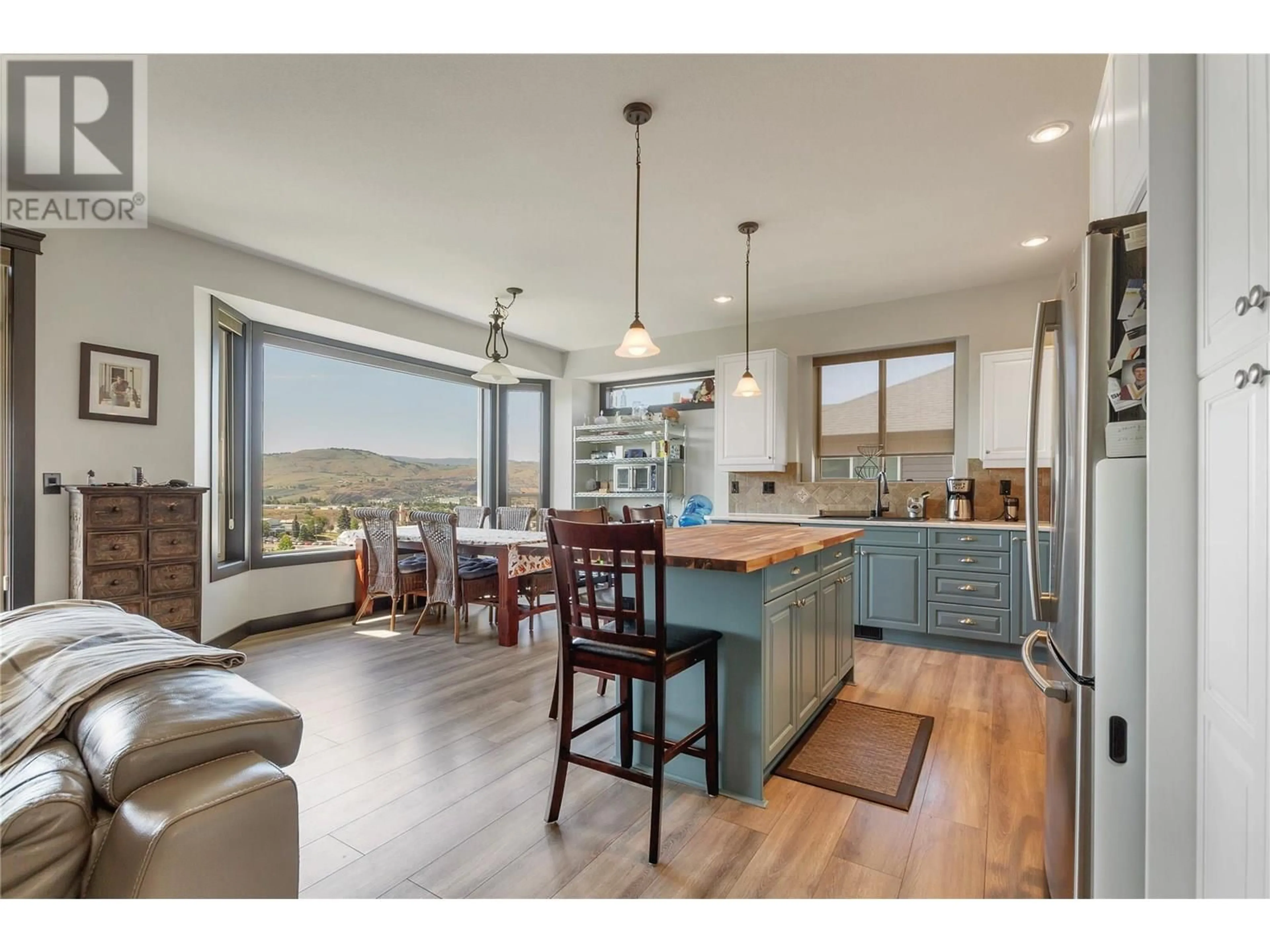 Open concept kitchen, wood/laminate floor for 1008 MT. BEGBIE DRIVE, Vernon British Columbia V1B4A2