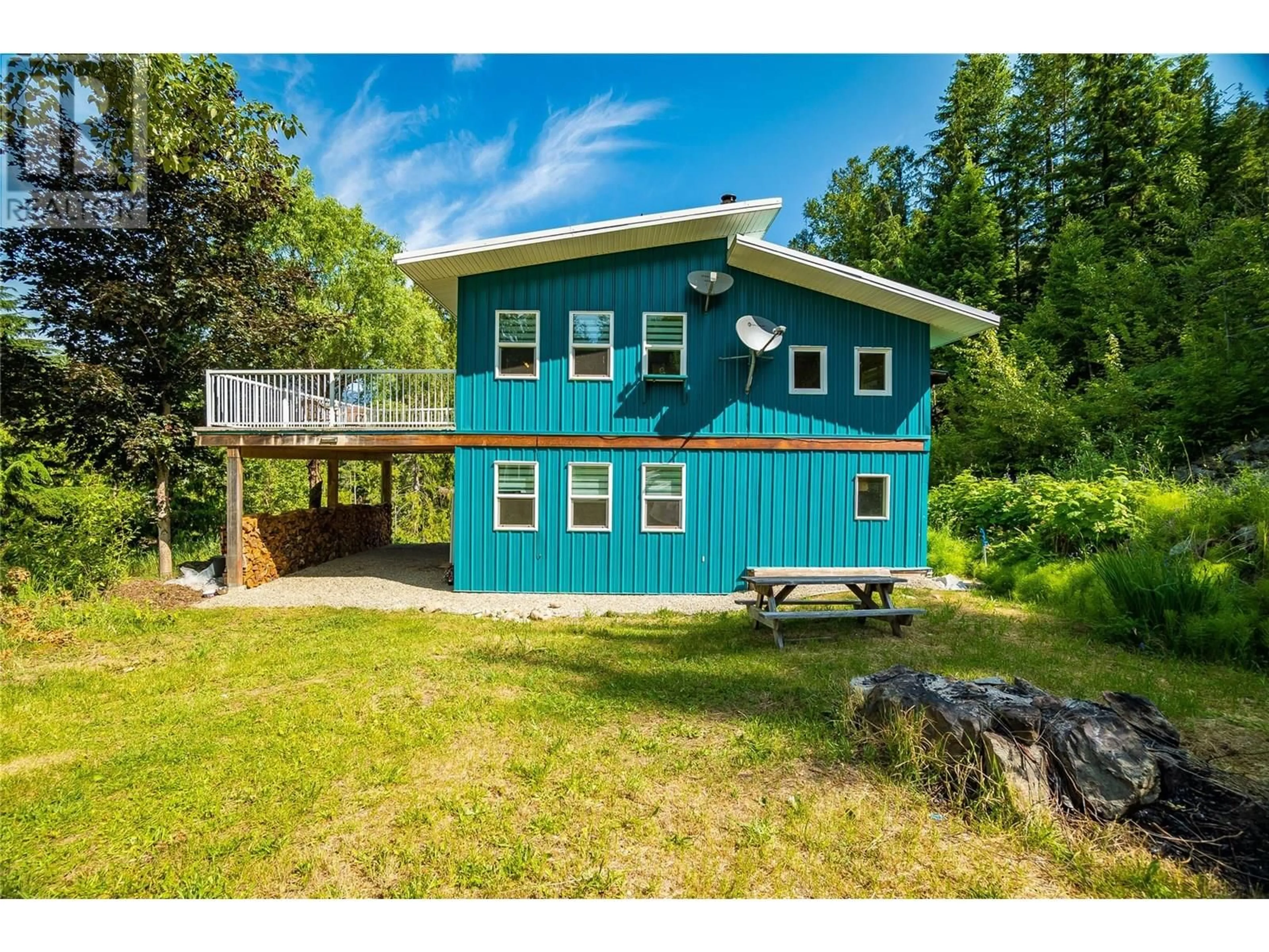 A pic from outside/outdoor area/front of a property/back of a property/a pic from drone, water/lake/river/ocean view for 8140 6 HIGHWAY, Lemon Creek British Columbia V0G2C0