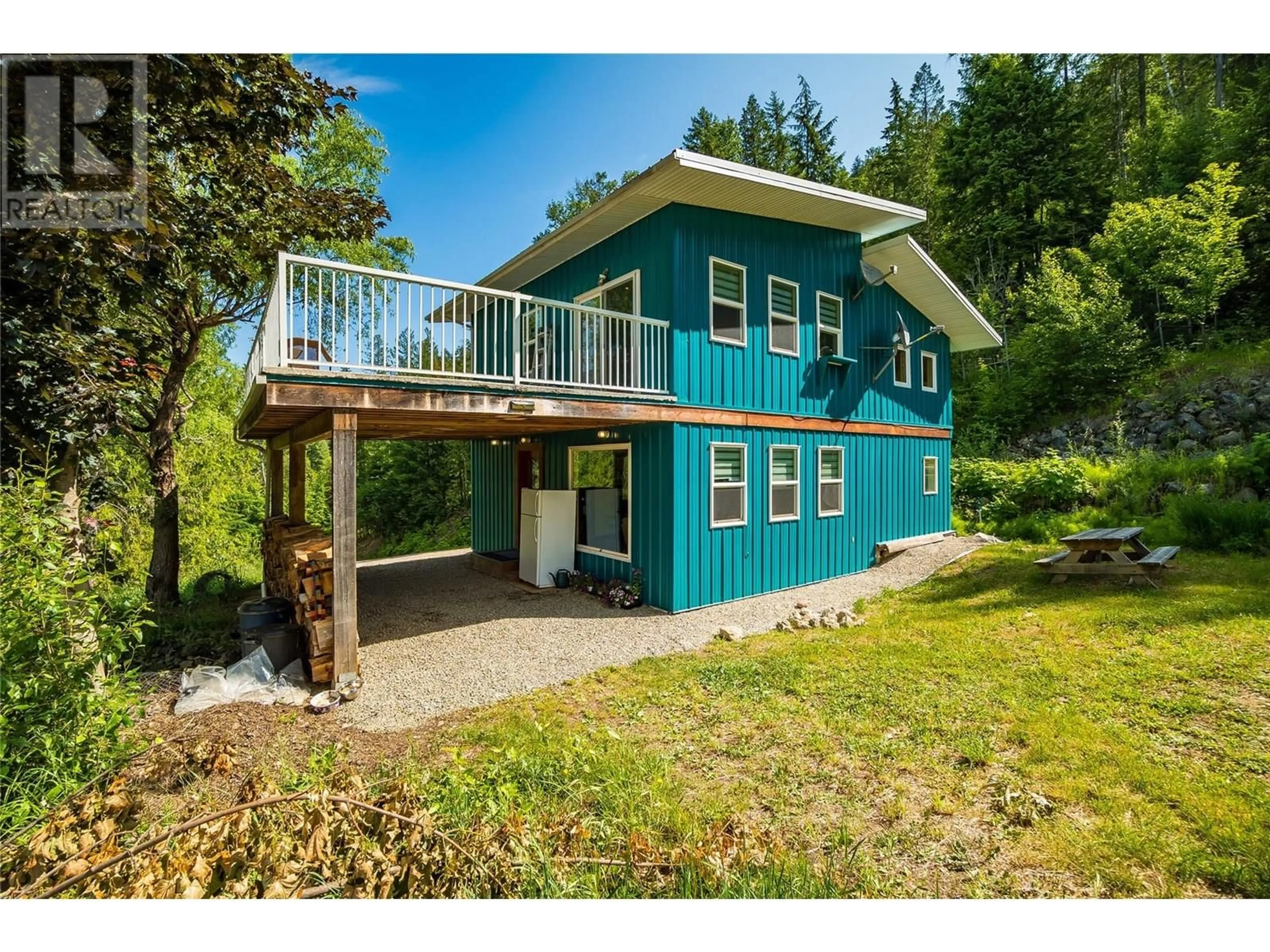 A pic from outside/outdoor area/front of a property/back of a property/a pic from drone, water/lake/river/ocean view for 8140 6 HIGHWAY, Lemon Creek British Columbia V0G2C0