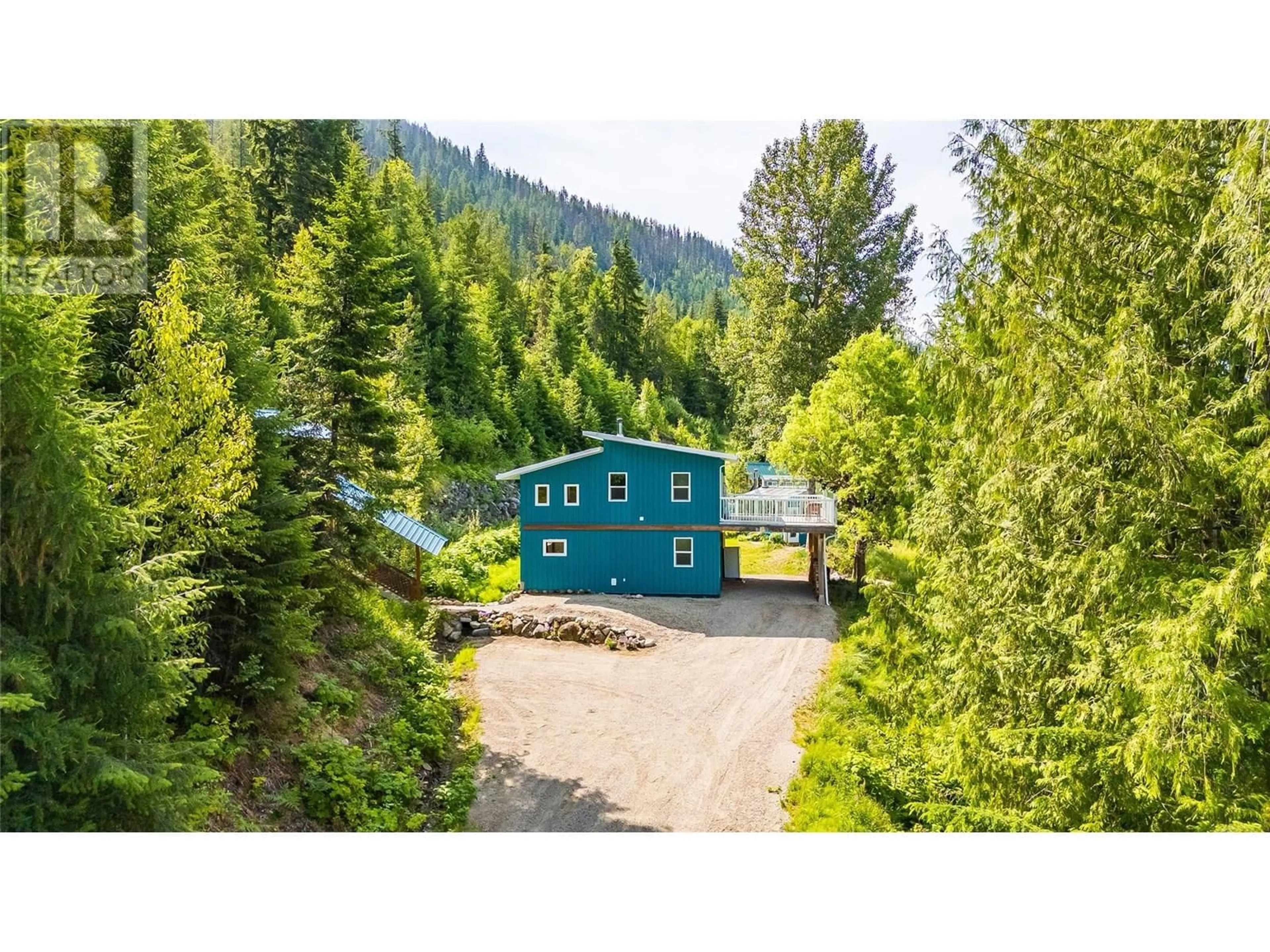 A pic from outside/outdoor area/front of a property/back of a property/a pic from drone, forest/trees view for 8140 6 HIGHWAY, Lemon Creek British Columbia V0G2C0