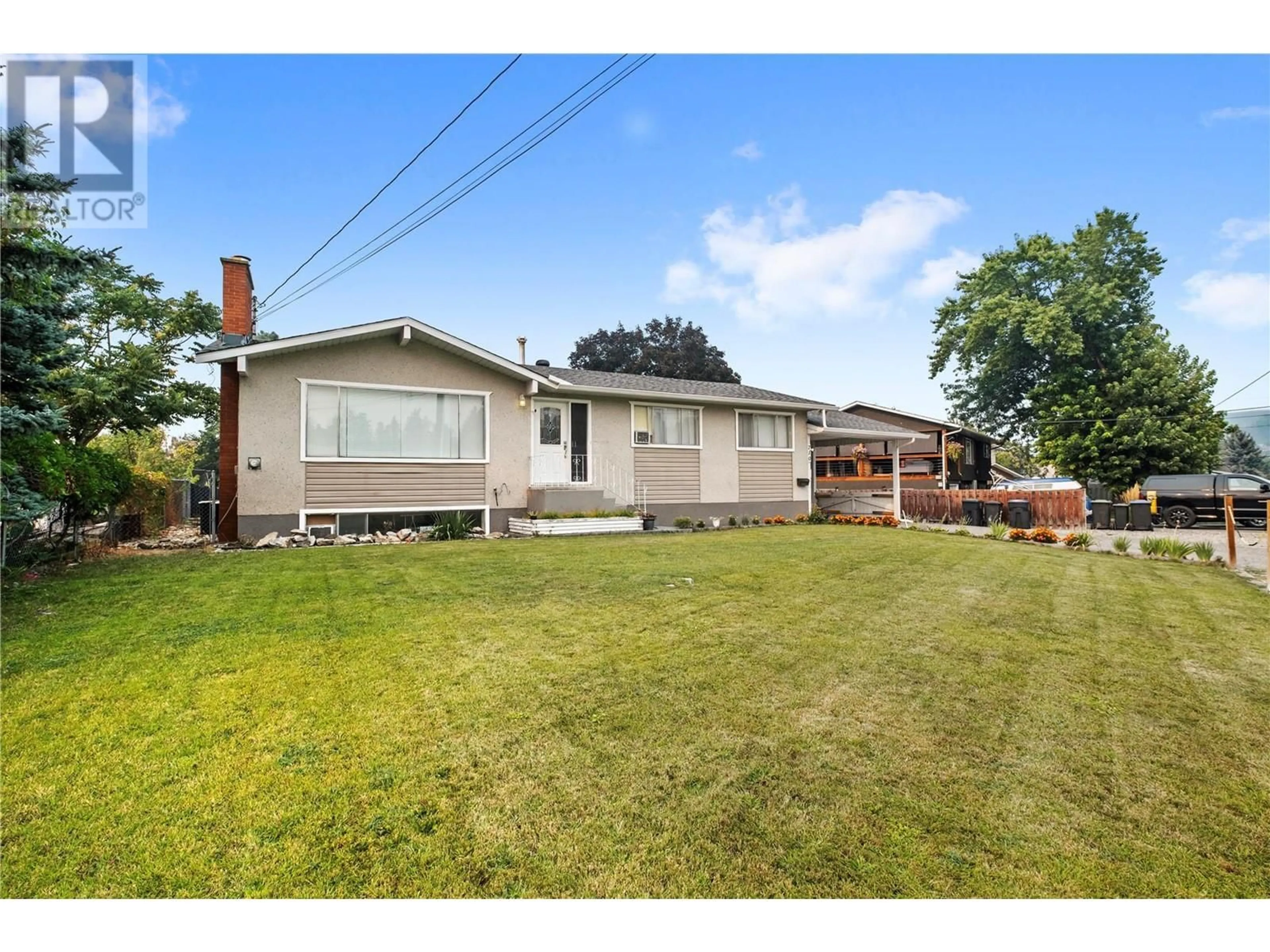 A pic from outside/outdoor area/front of a property/back of a property/a pic from drone, street for 710 BELL ROAD, Rutland British Columbia V1X2Y1
