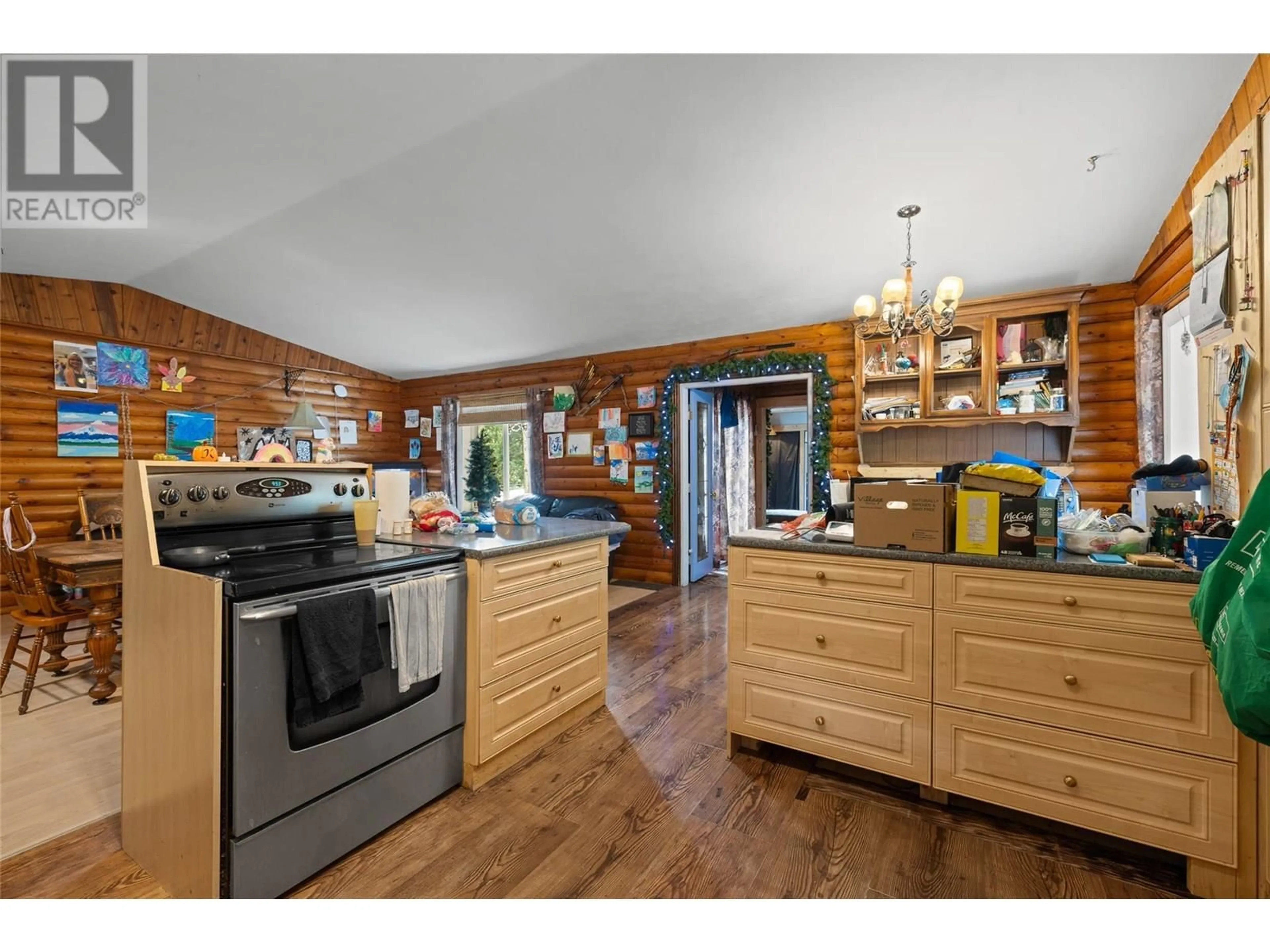 Open concept kitchen, wood/laminate floor for 3425 MCKELLAR ROAD, West Kelowna British Columbia V4T1W1