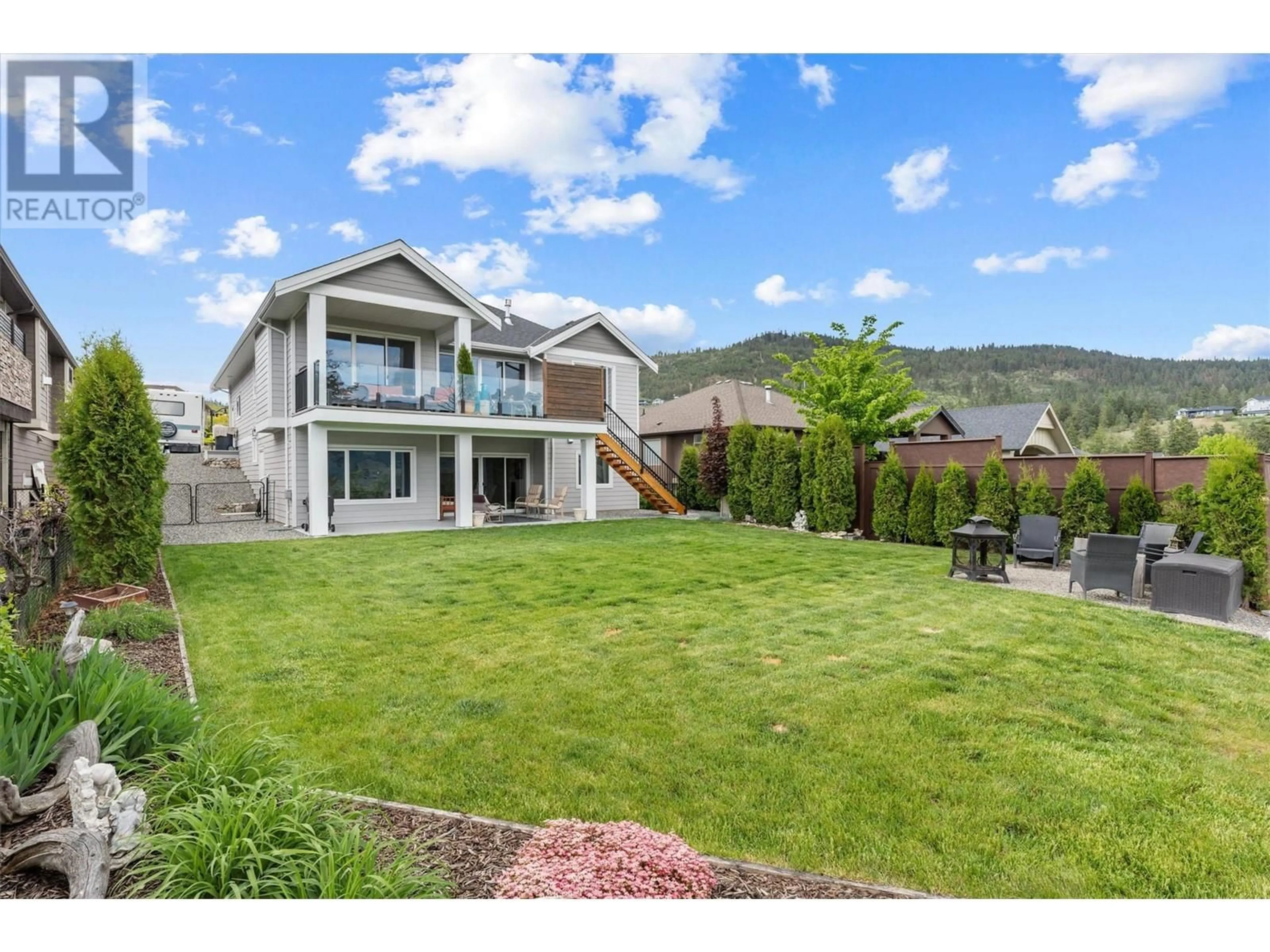 A pic from outside/outdoor area/front of a property/back of a property/a pic from drone, mountain view for 13137 CLIFFSTONE COURT, Lake Country British Columbia V4V2R1