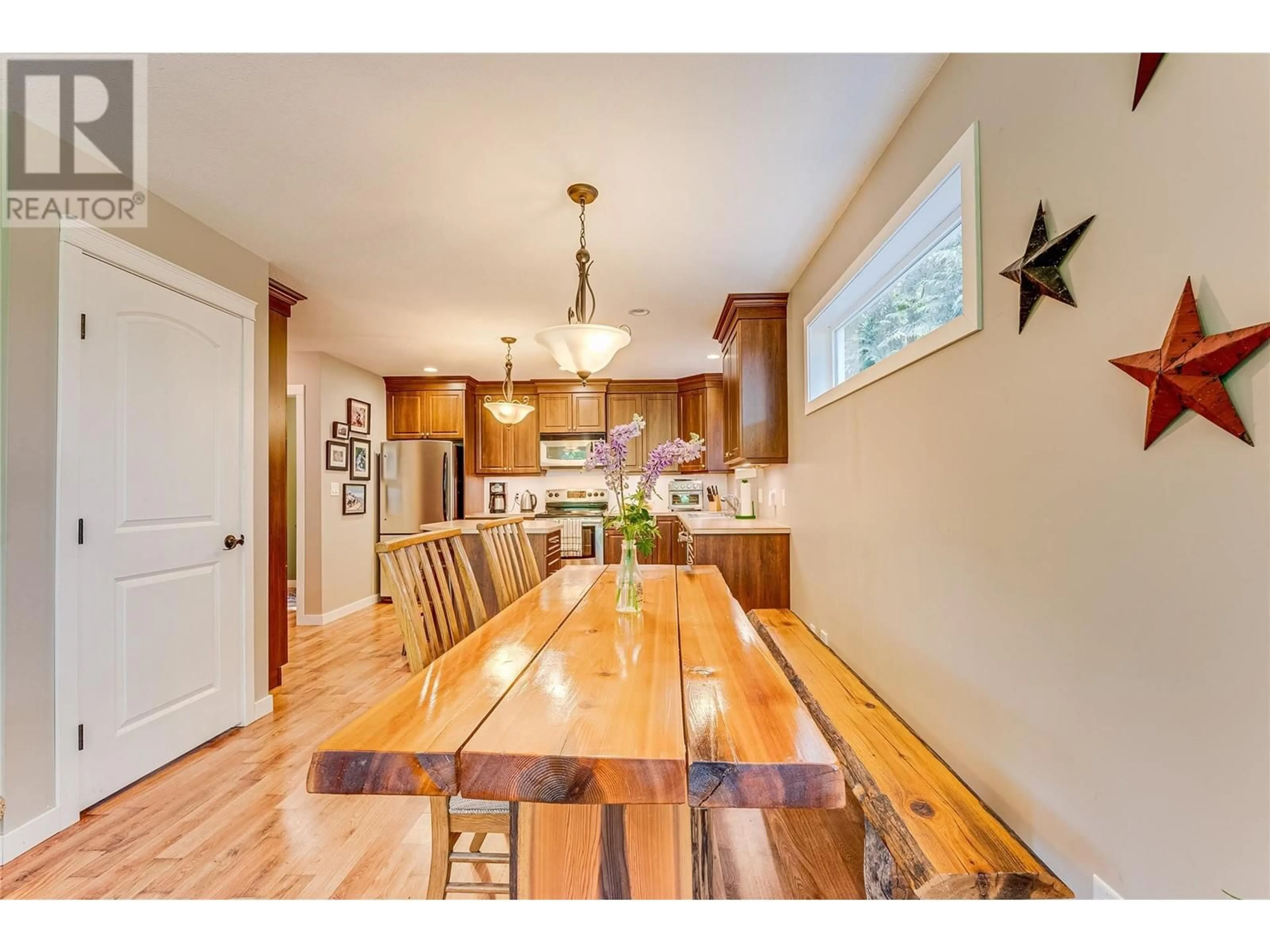 Dining room, wood/laminate floor for 593 DAVIDSON DRIVE, Swansea Point British Columbia V0E2K2
