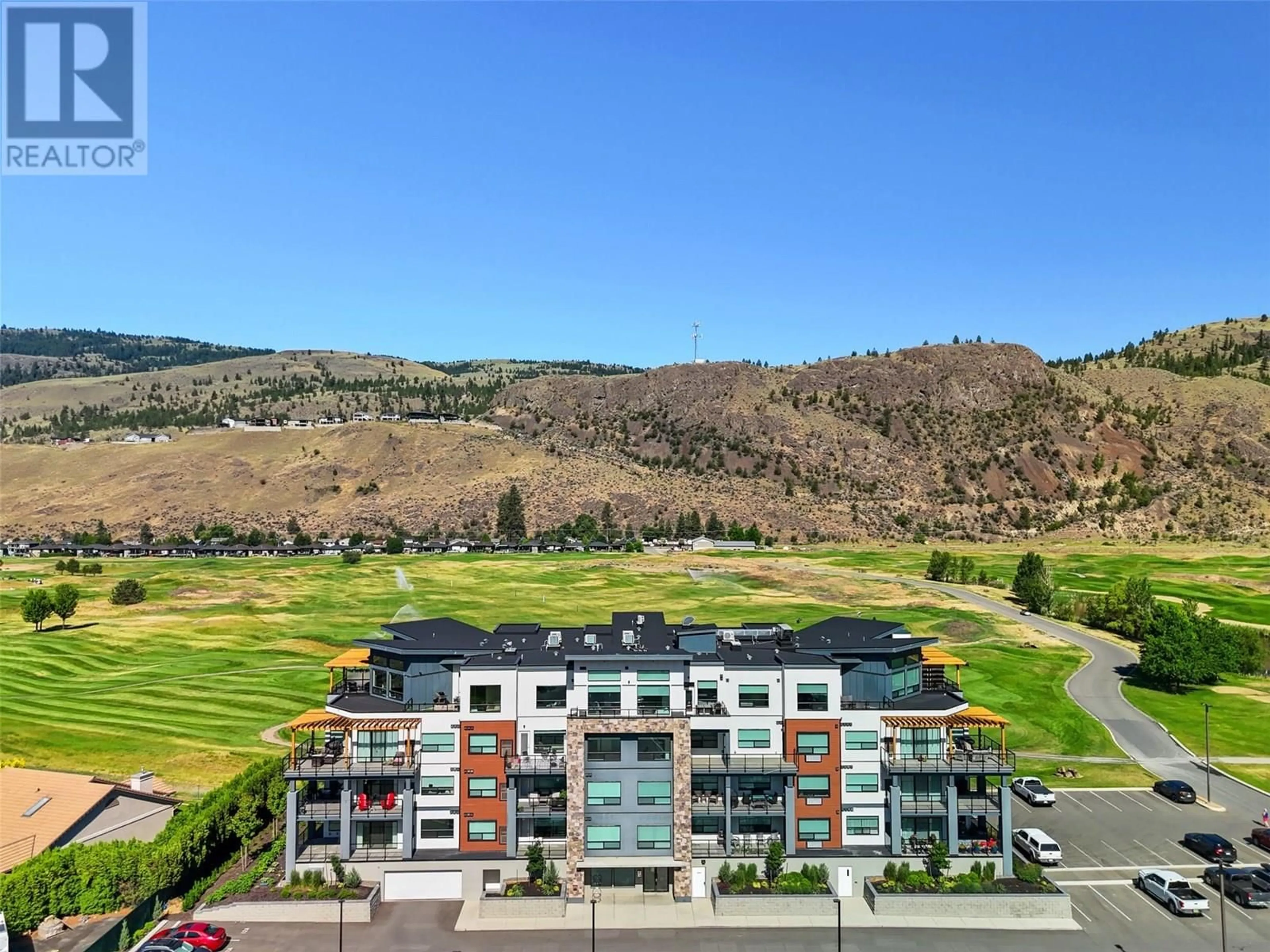 A pic from outside/outdoor area/front of a property/back of a property/a pic from drone, mountain view for 402 - 651 DUNES DRIVE, Kamloops British Columbia V2B8M8
