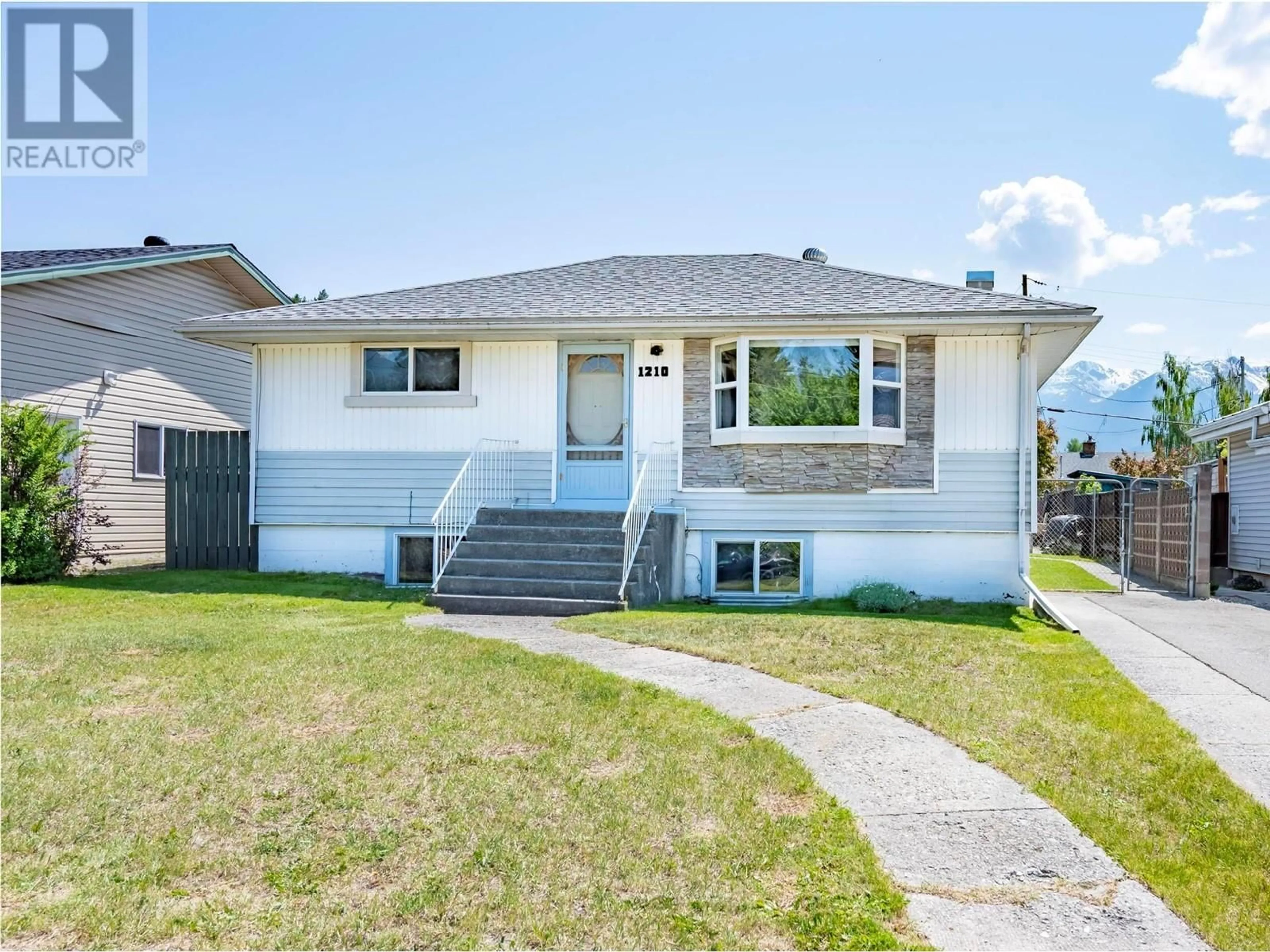 Home with vinyl exterior material, street for 1210 12TH STREET SOUTH, Golden British Columbia V0A1H0