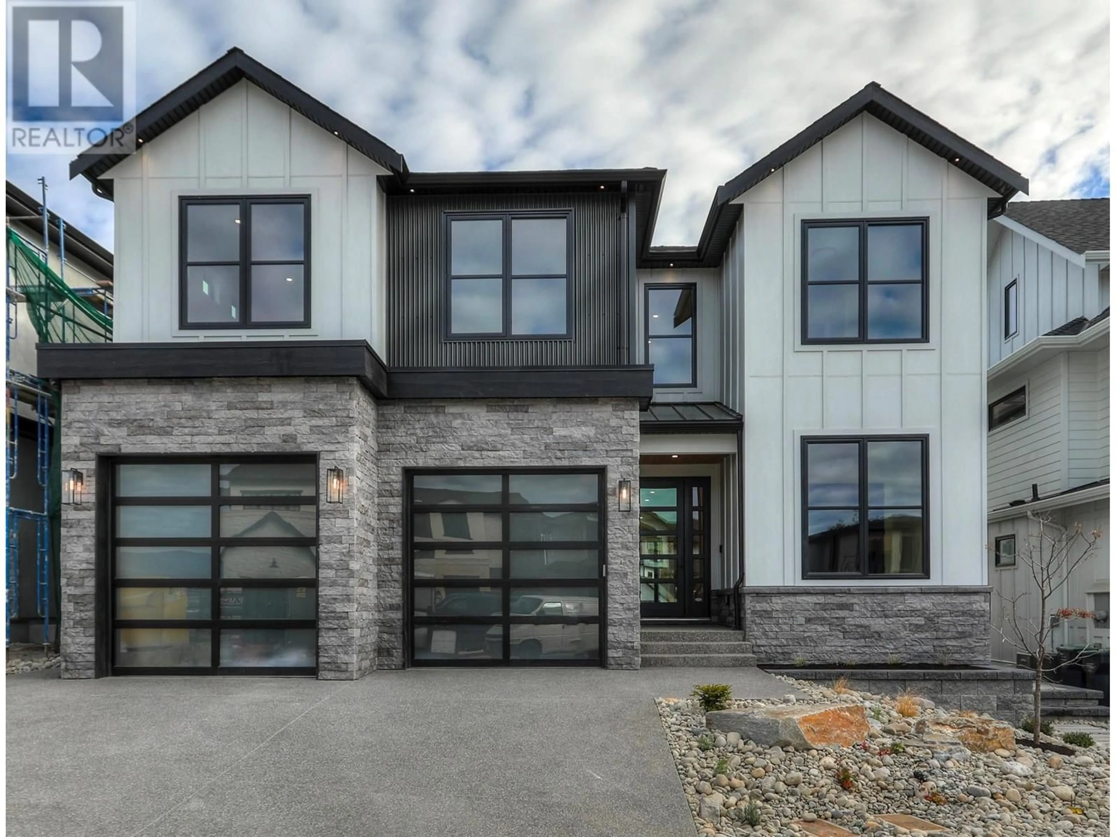 Home with brick exterior material, unknown for 5533 FOOTHILL COURT, Kelowna British Columbia V1W0C4