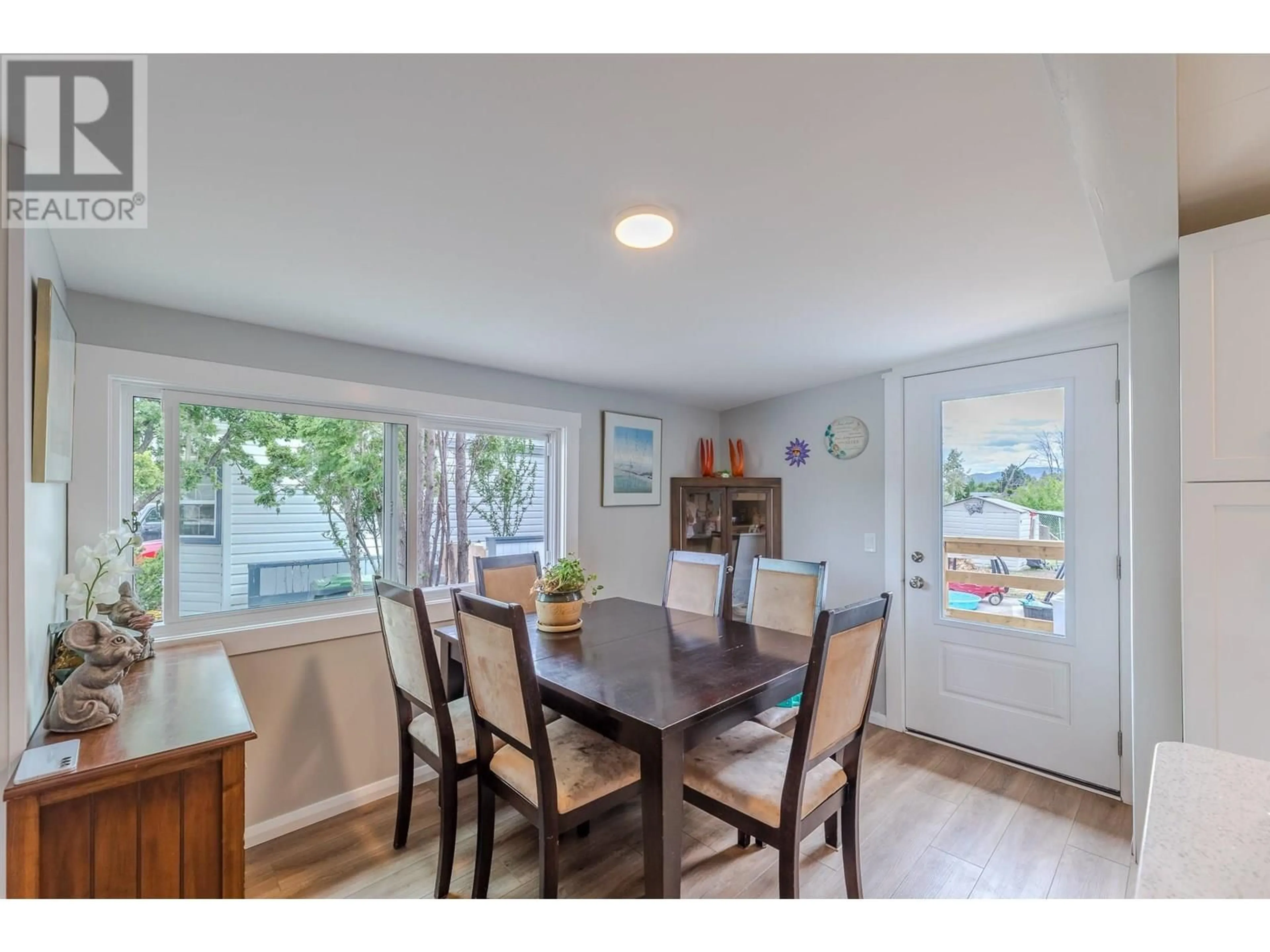 Dining room, wood/laminate floor for 70 - 3245 PARIS STREET, Penticton British Columbia V2A3T9