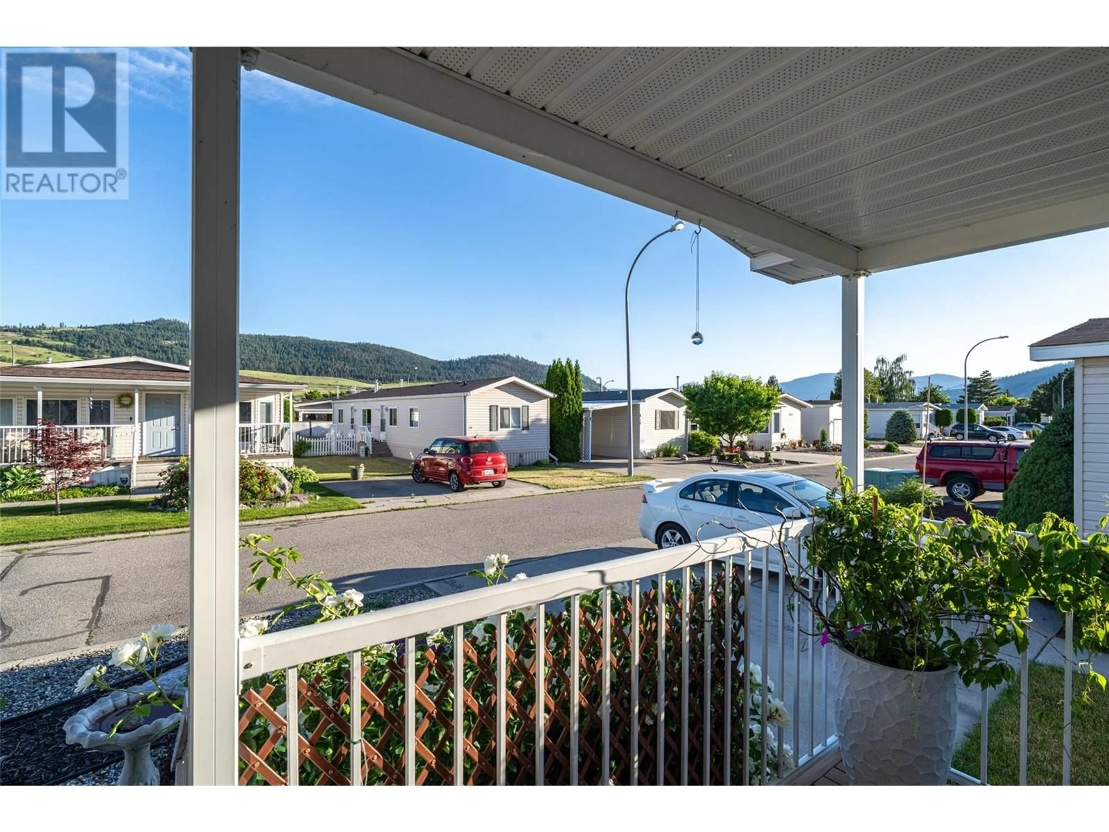 Patio, mountain view for 13 - 6688 TRONSON ROAD, Vernon British Columbia V1H1R9