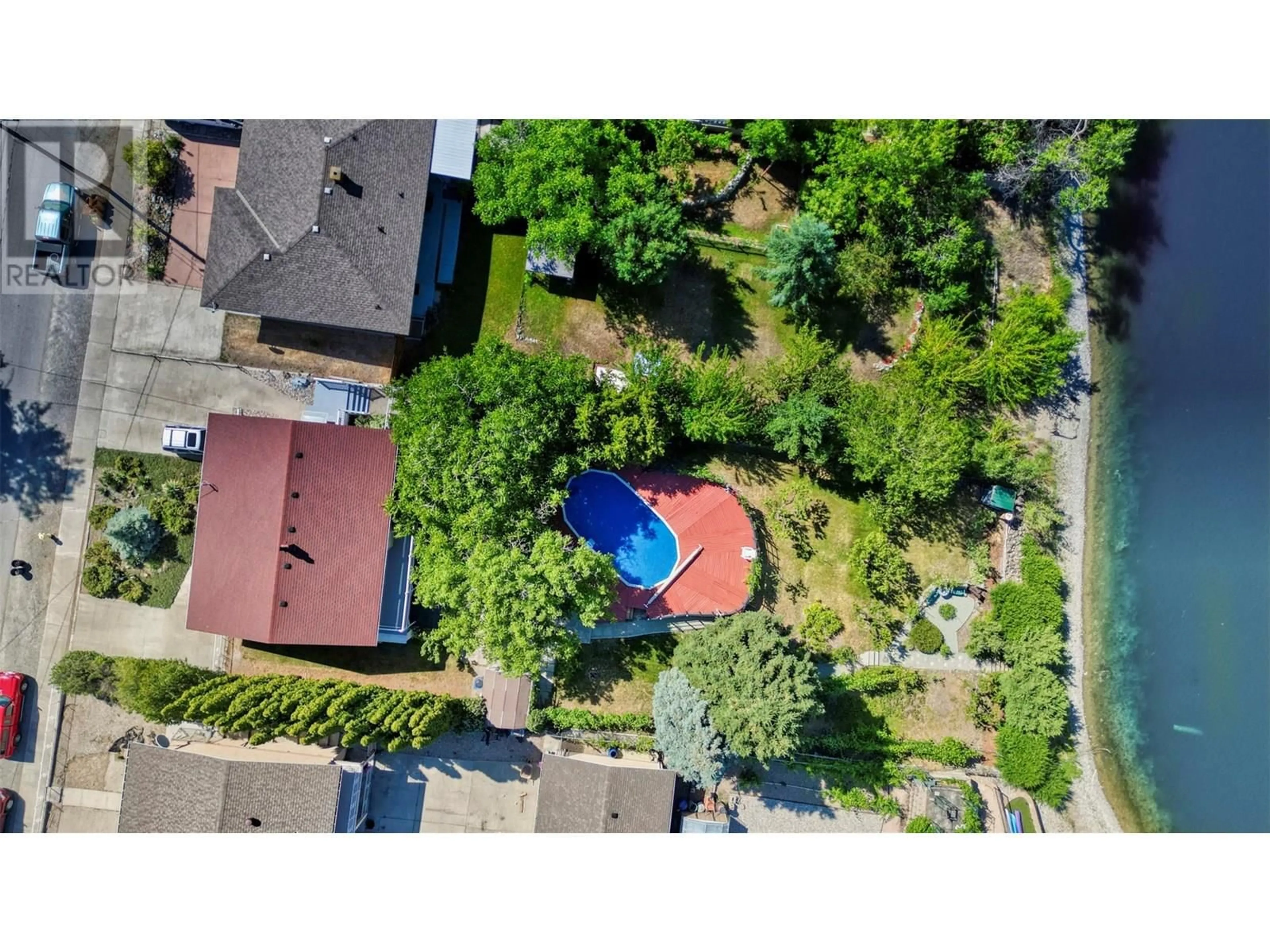 A pic from outside/outdoor area/front of a property/back of a property/a pic from drone, unknown for 8014 89TH STREET, Osoyoos British Columbia V0H1V1