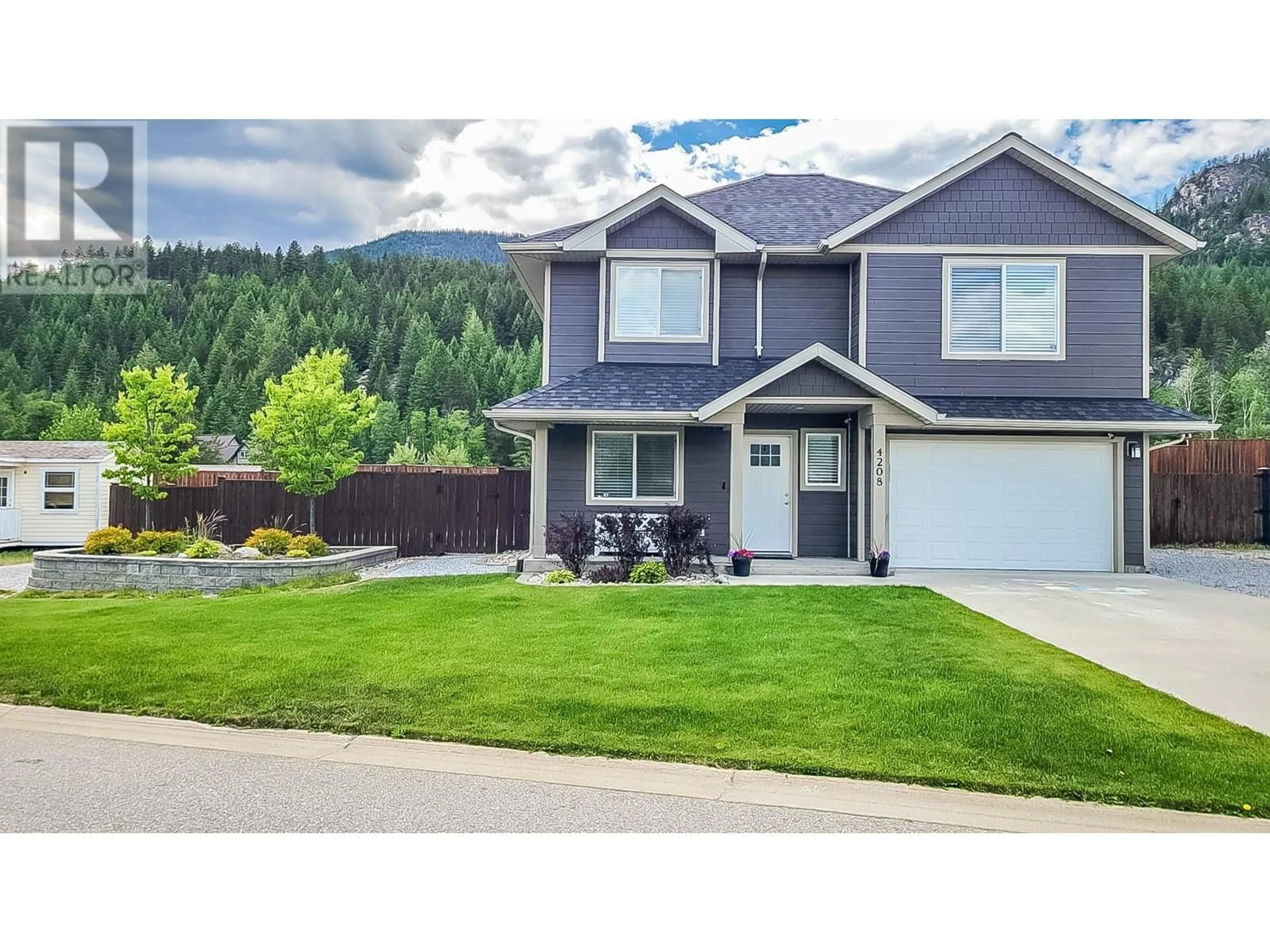 Home with vinyl exterior material, mountain view for 4208 16TH AVENUE, Castlegar British Columbia V1N4X7