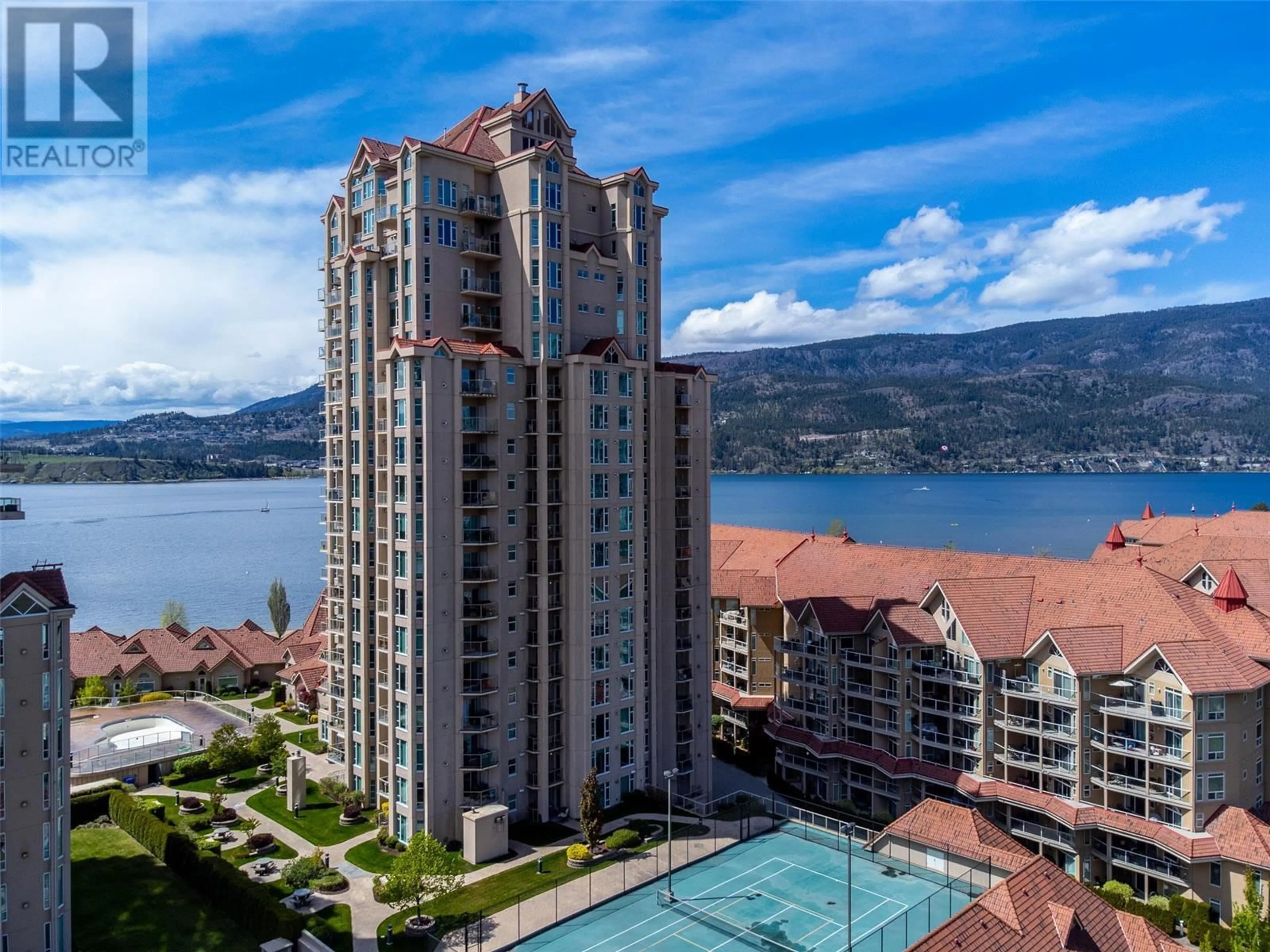 A pic from outside/outdoor area/front of a property/back of a property/a pic from drone, water/lake/river/ocean view for 401 - 1128 SUNSET DRIVE, Kelowna British Columbia V1Y9W7