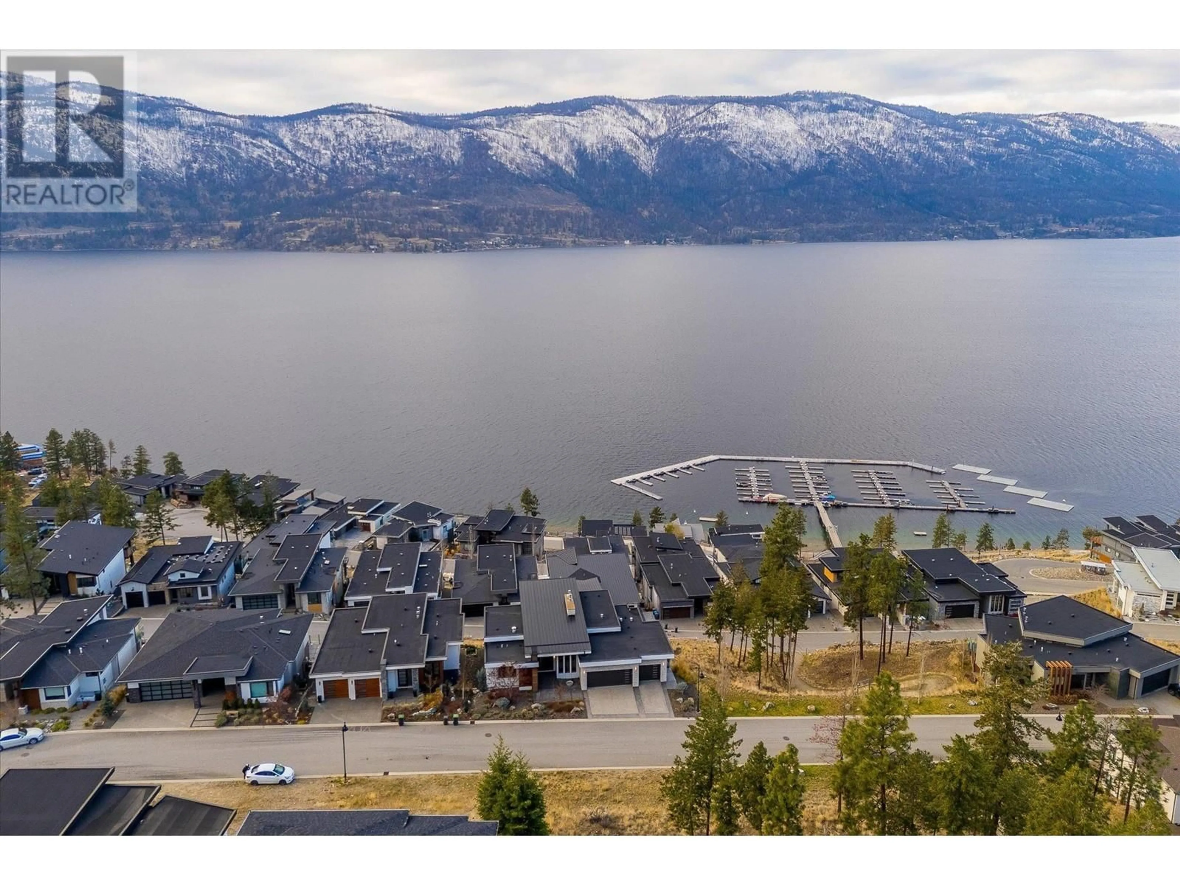 A pic from outside/outdoor area/front of a property/back of a property/a pic from drone, water/lake/river/ocean view for 3380 WATER BIRCH CIRCLE, Kelowna British Columbia V1V3G1
