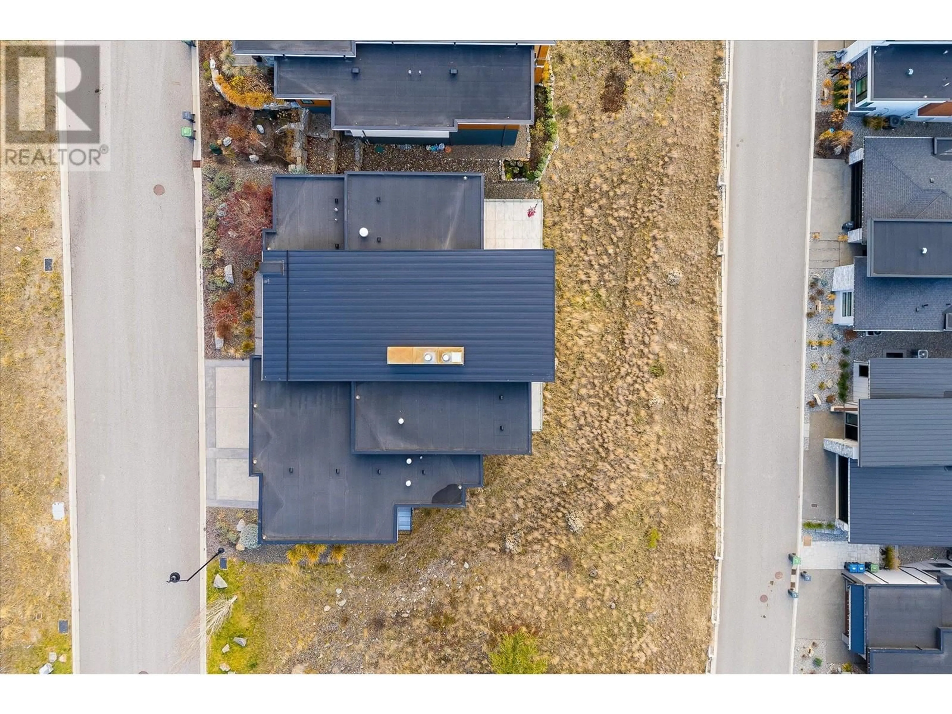 A pic from outside/outdoor area/front of a property/back of a property/a pic from drone, unknown for 3380 WATER BIRCH CIRCLE, Kelowna British Columbia V1V3G1