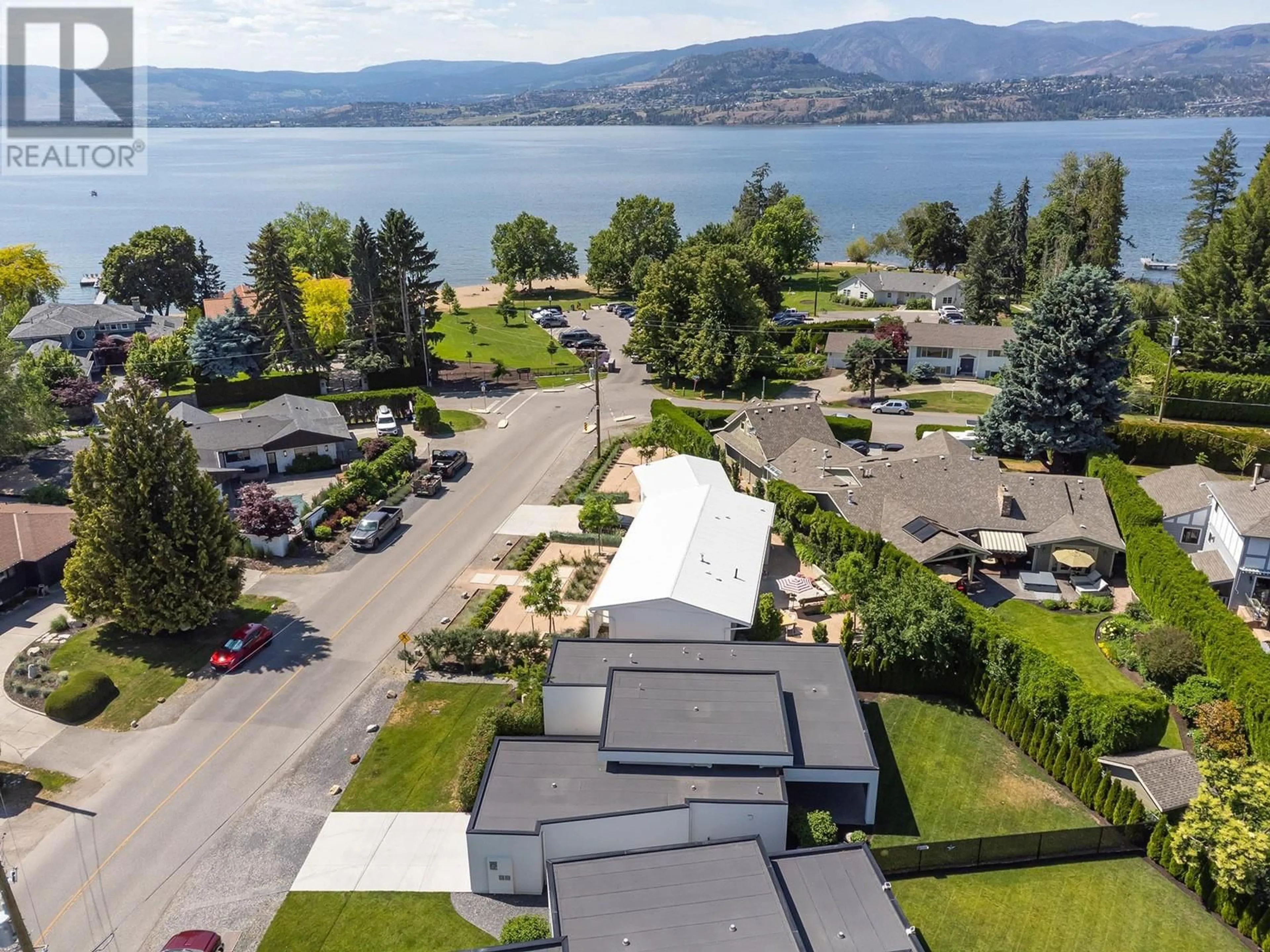 A pic from outside/outdoor area/front of a property/back of a property/a pic from drone, water/lake/river/ocean view for 410 SARSONS ROAD, Kelowna British Columbia V1W1C2